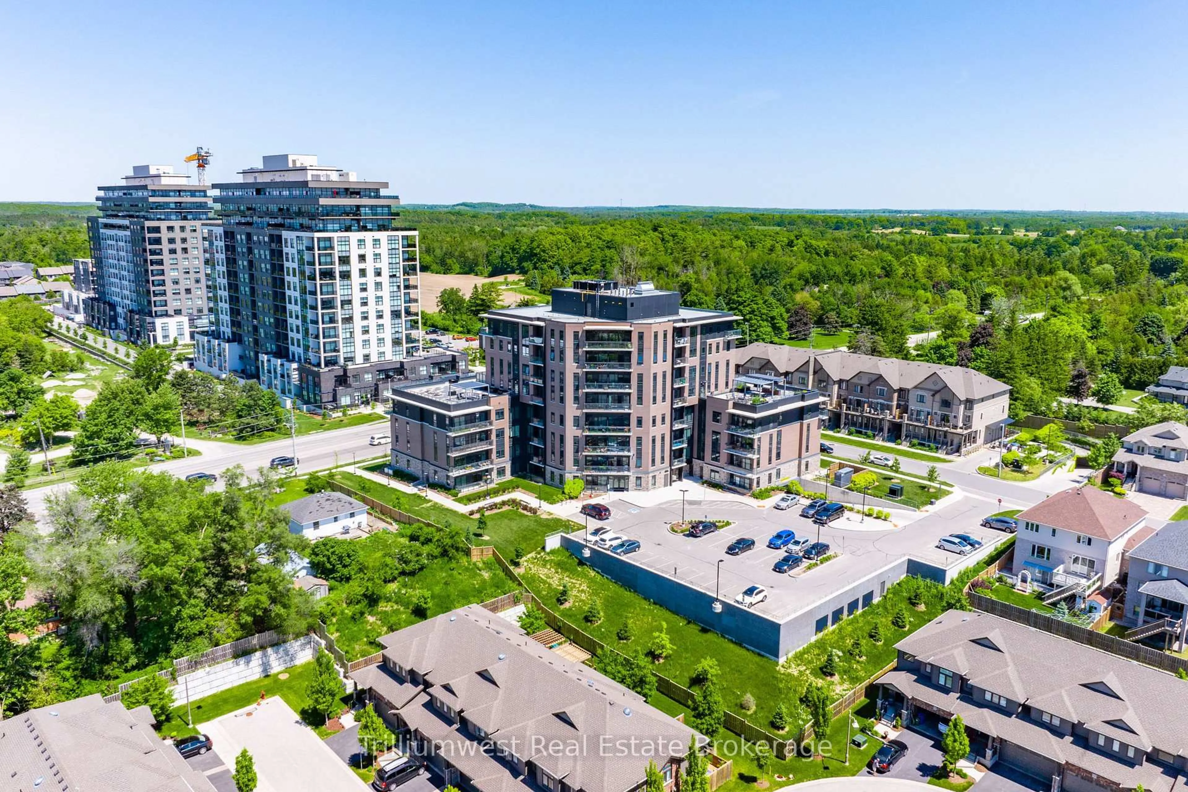 A pic from outside/outdoor area/front of a property/back of a property/a pic from drone, city buildings view from balcony for 332 Gosling Gdns #202, Guelph Ontario N1L 0P8