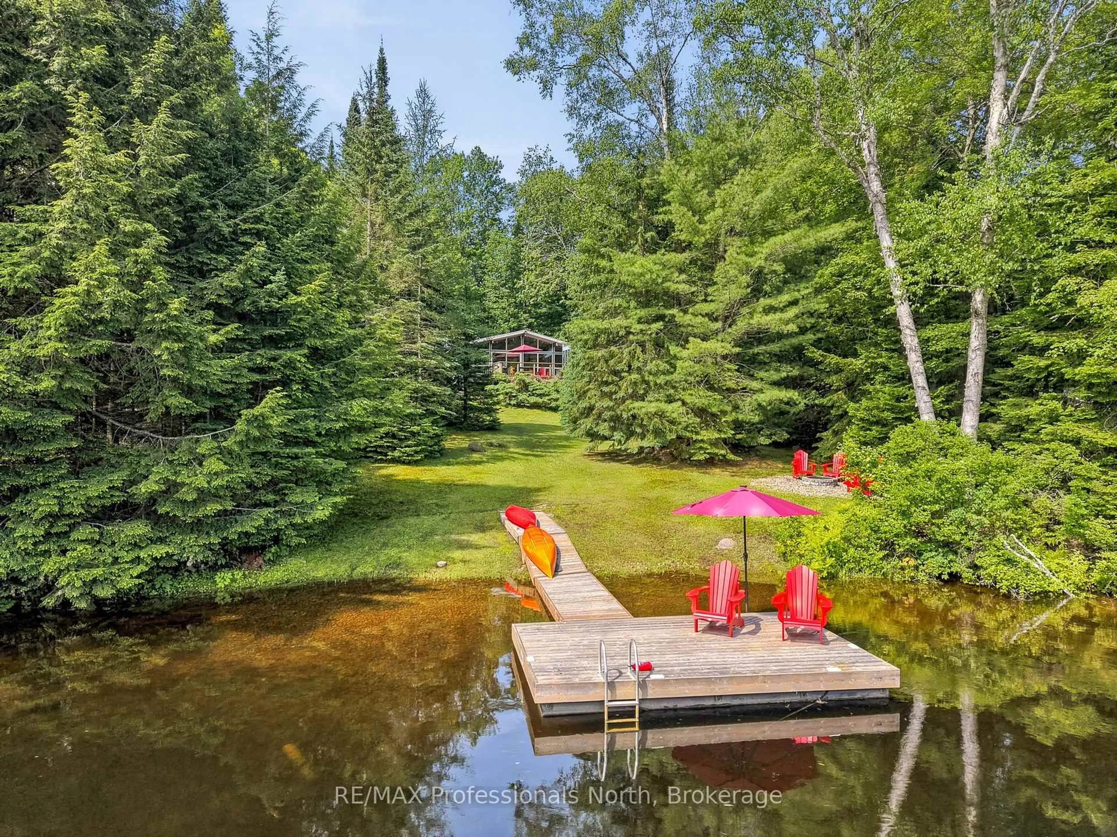 A pic from outside/outdoor area/front of a property/back of a property/a pic from drone, water/lake/river/ocean view for 1245 Sherwood Forest Rd, Bracebridge Ontario P1L 1X3