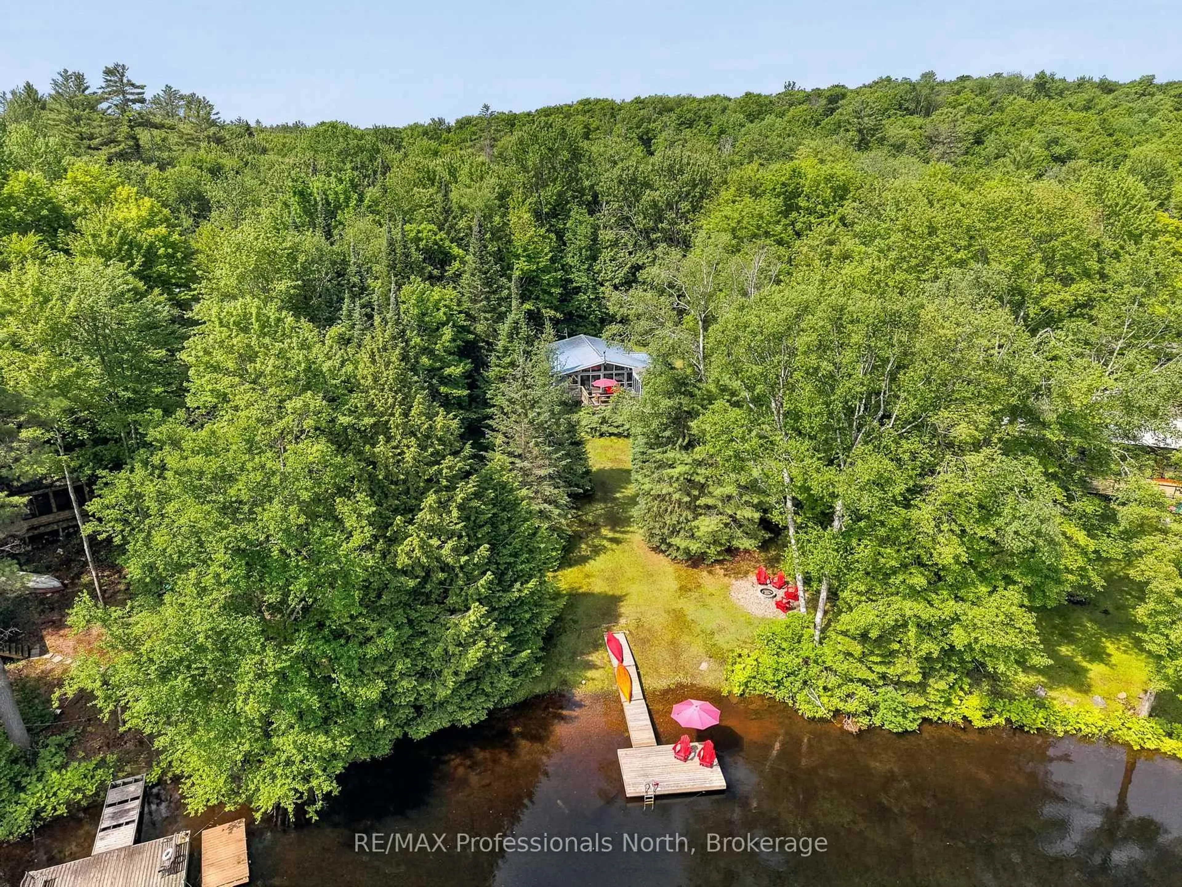 A pic from outside/outdoor area/front of a property/back of a property/a pic from drone, water/lake/river/ocean view for 1245 Sherwood Forest Rd, Bracebridge Ontario P1L 1X3
