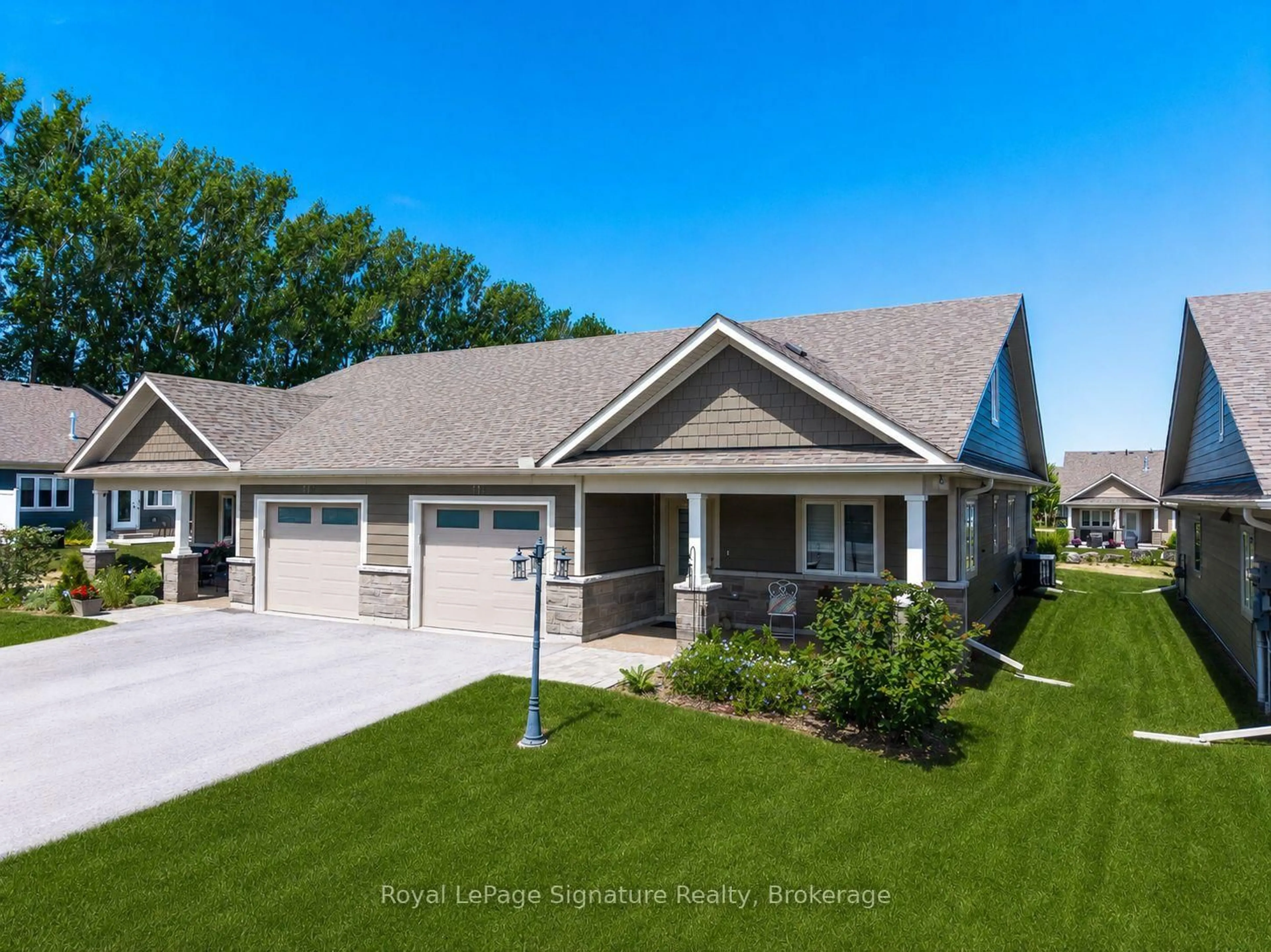 Home with vinyl exterior material, street for 114 Dove Dr, Blue Mountains Ontario N0H 2P0