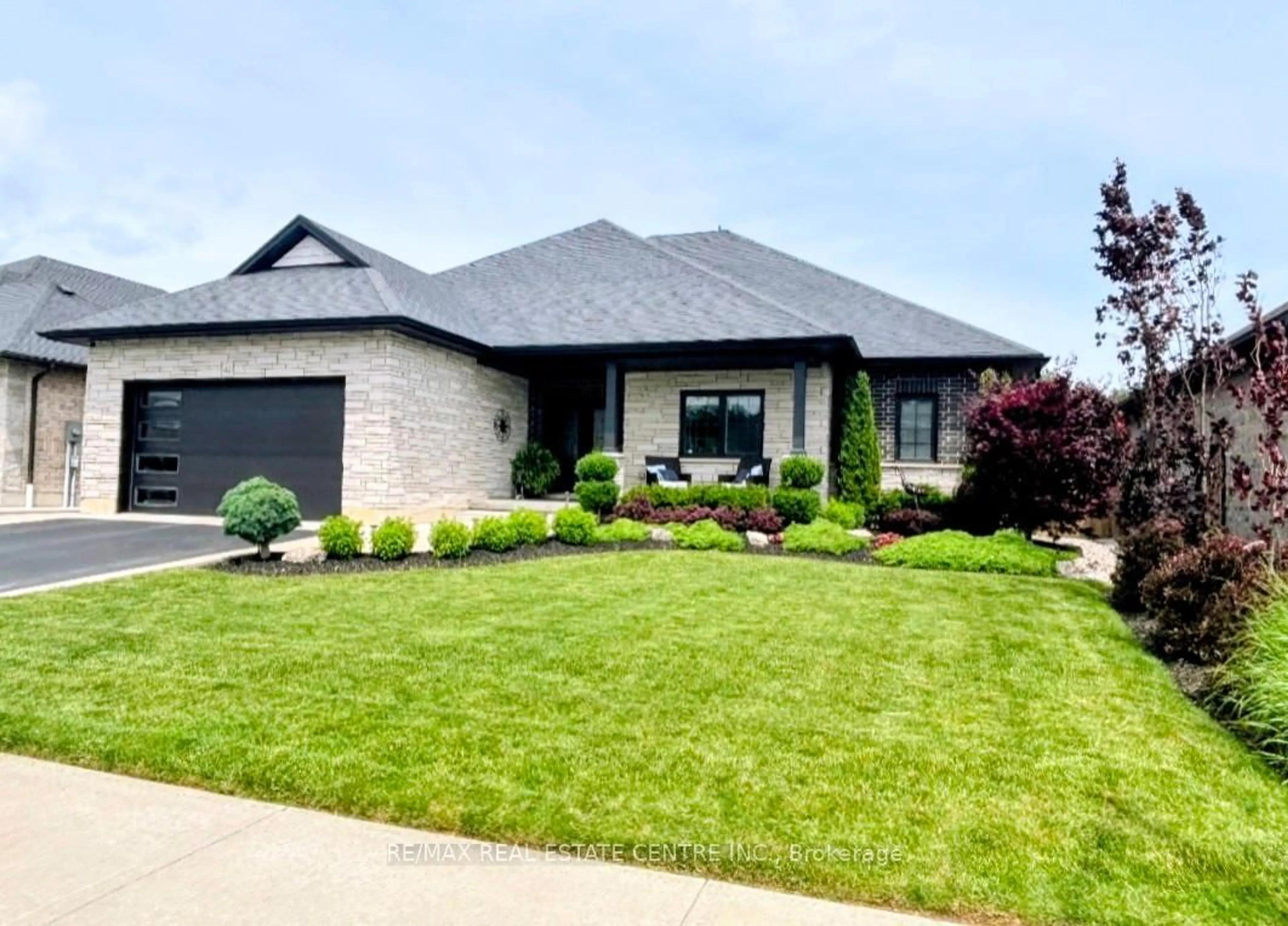 Home with brick exterior material, street for 42 Bluenose Dr, Norfolk Ontario N0A 1N7