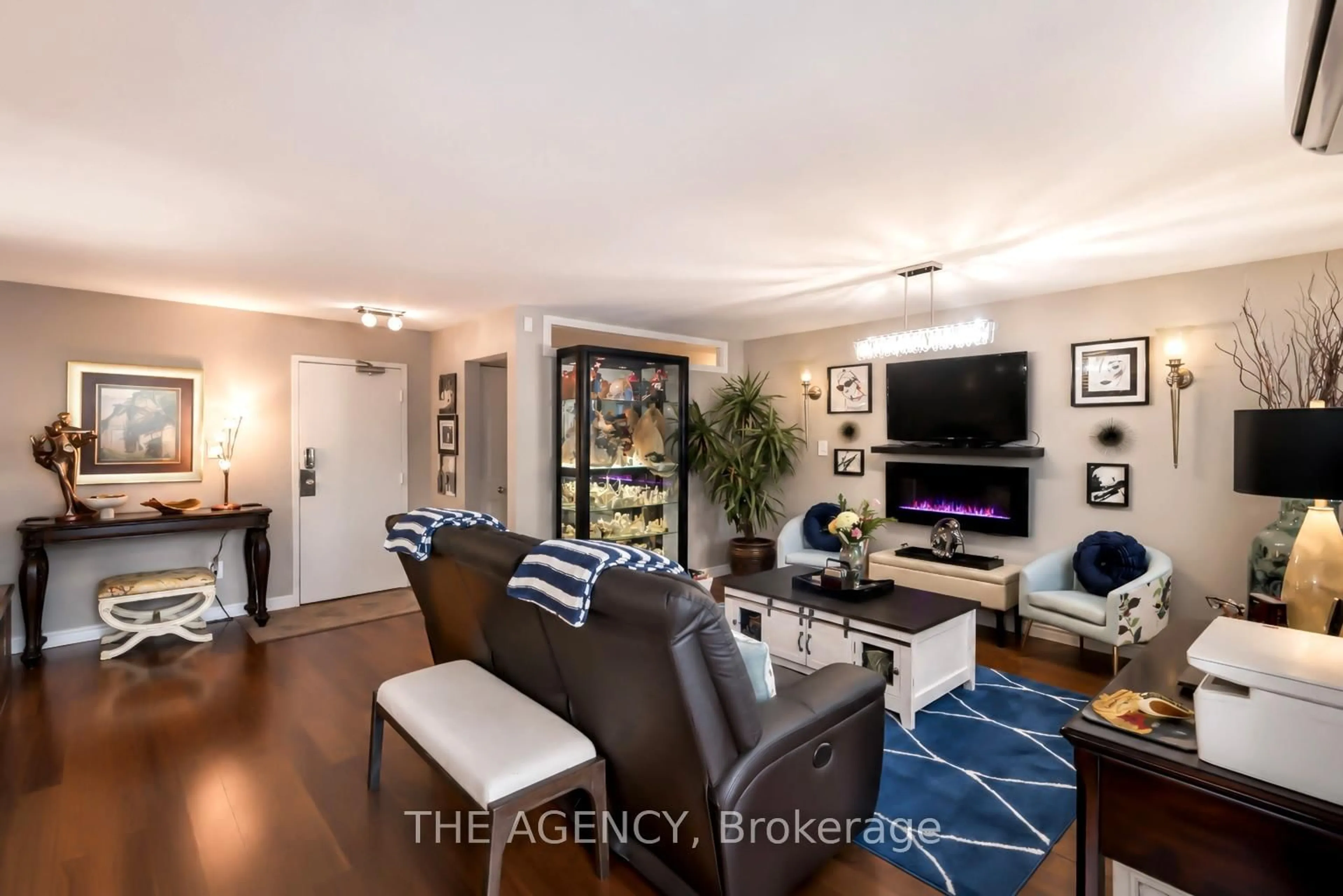 Living room with furniture, unknown for 793 Colborne St #212, Brantford Ontario N3S 7J3