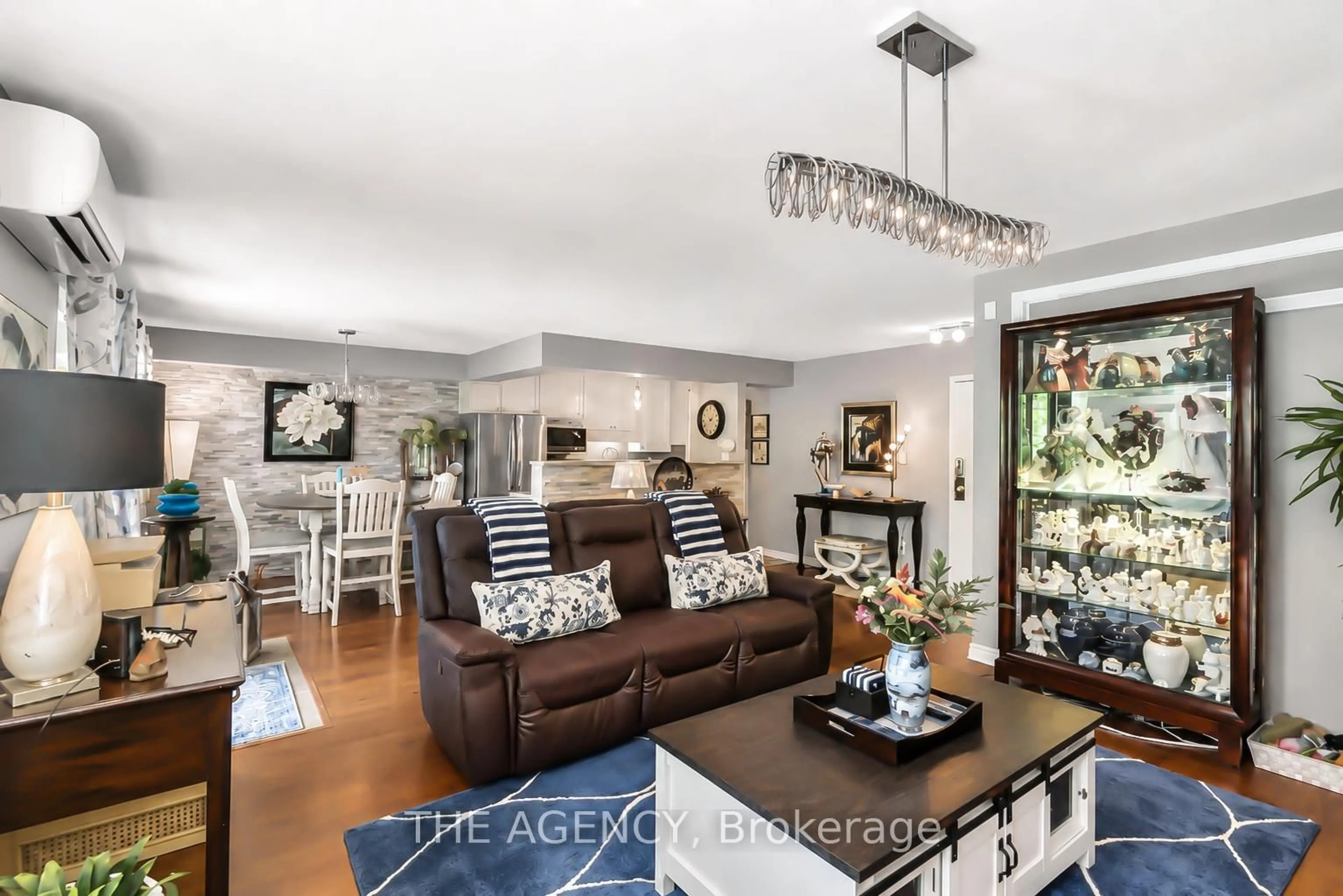Living room with furniture, unknown for 793 Colborne St #212, Brantford Ontario N3S 7J3