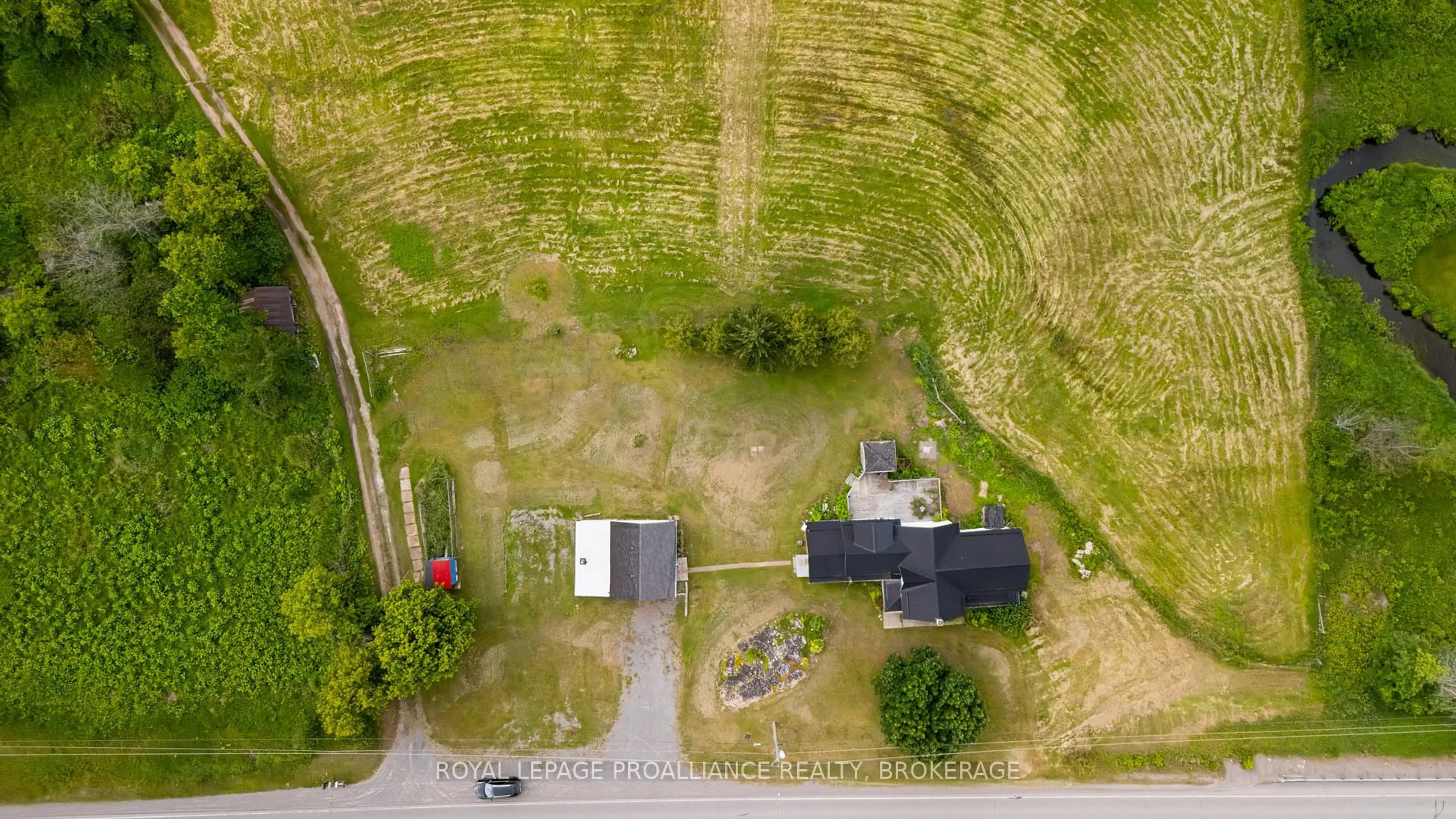 A pic from outside/outdoor area/front of a property/back of a property/a pic from drone, street for 3920 County Road 14, Kaladar Ontario K0K 1Z0