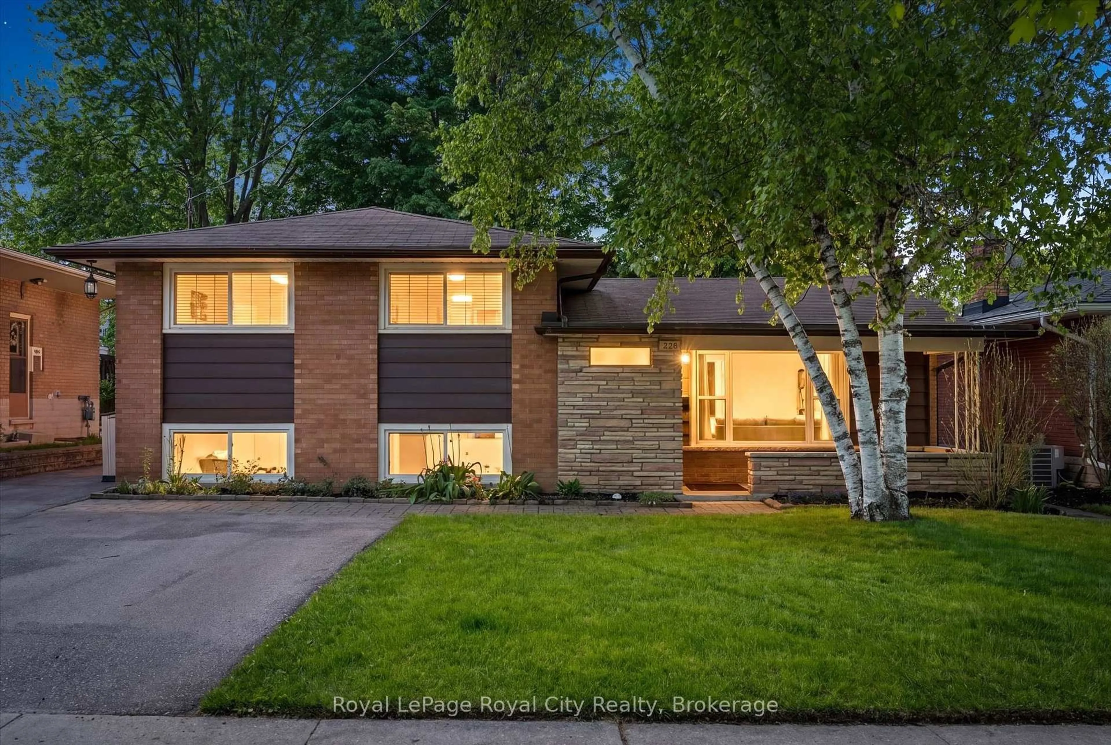 Home with brick exterior material, street for 229 Ross Ave, Kitchener Ontario N2A 1V7