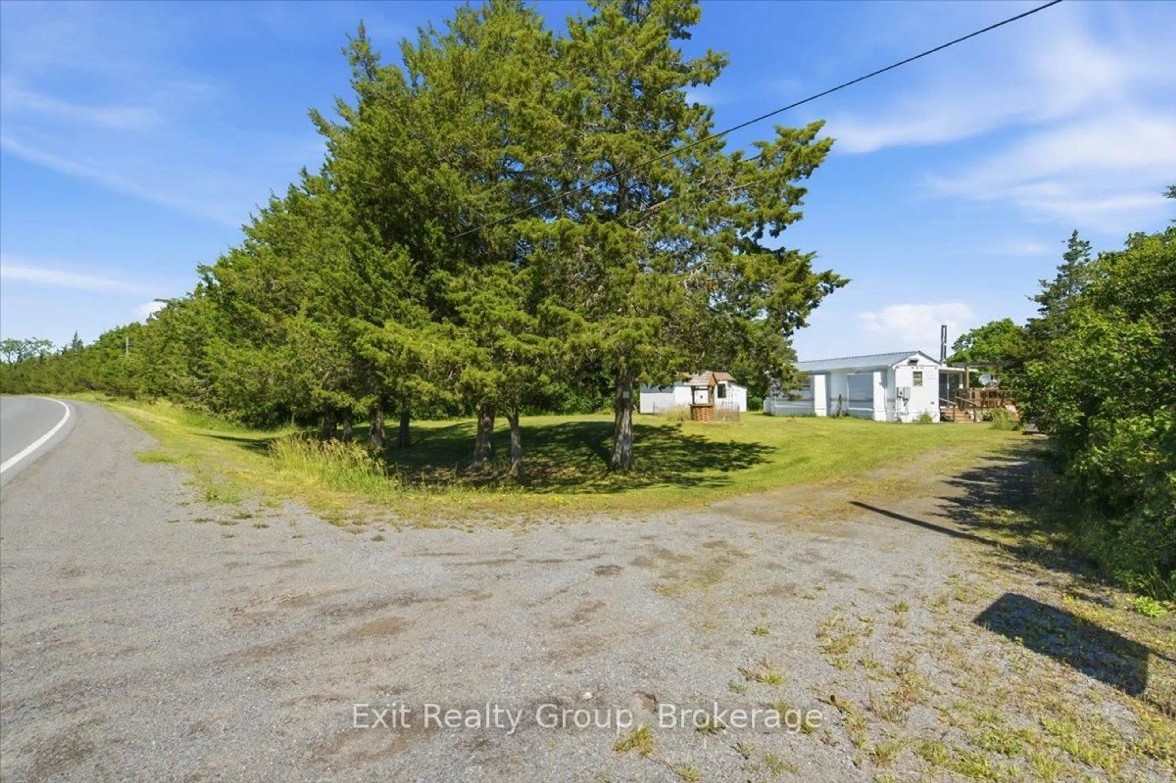 A pic from outside/outdoor area/front of a property/back of a property/a pic from drone, street for 1154 County Rd 14, Prince Edward County Ontario K0K 1W0