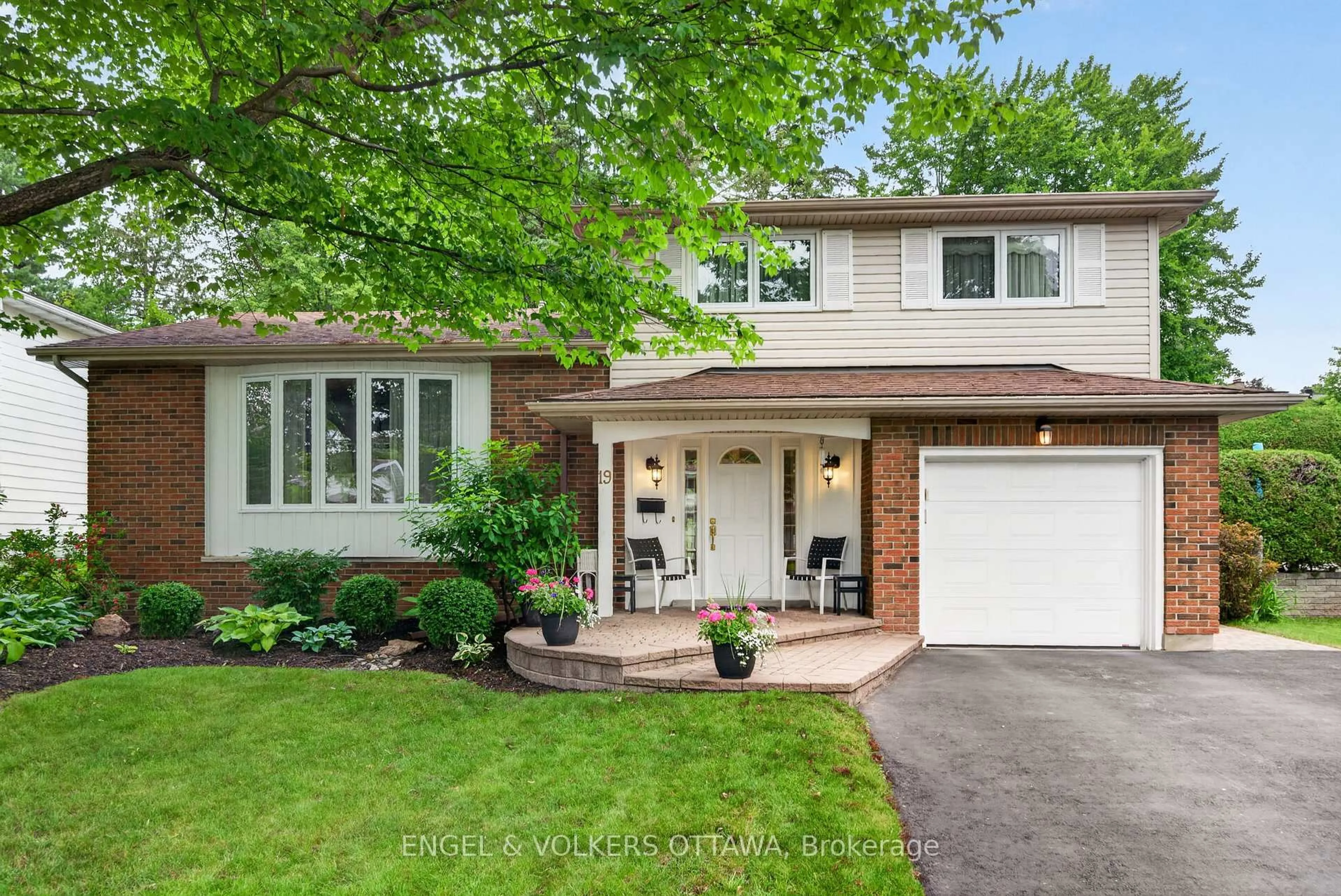 Home with brick exterior material, street for 19 Woodhill Cres, Ottawa Ontario K1B 3B7