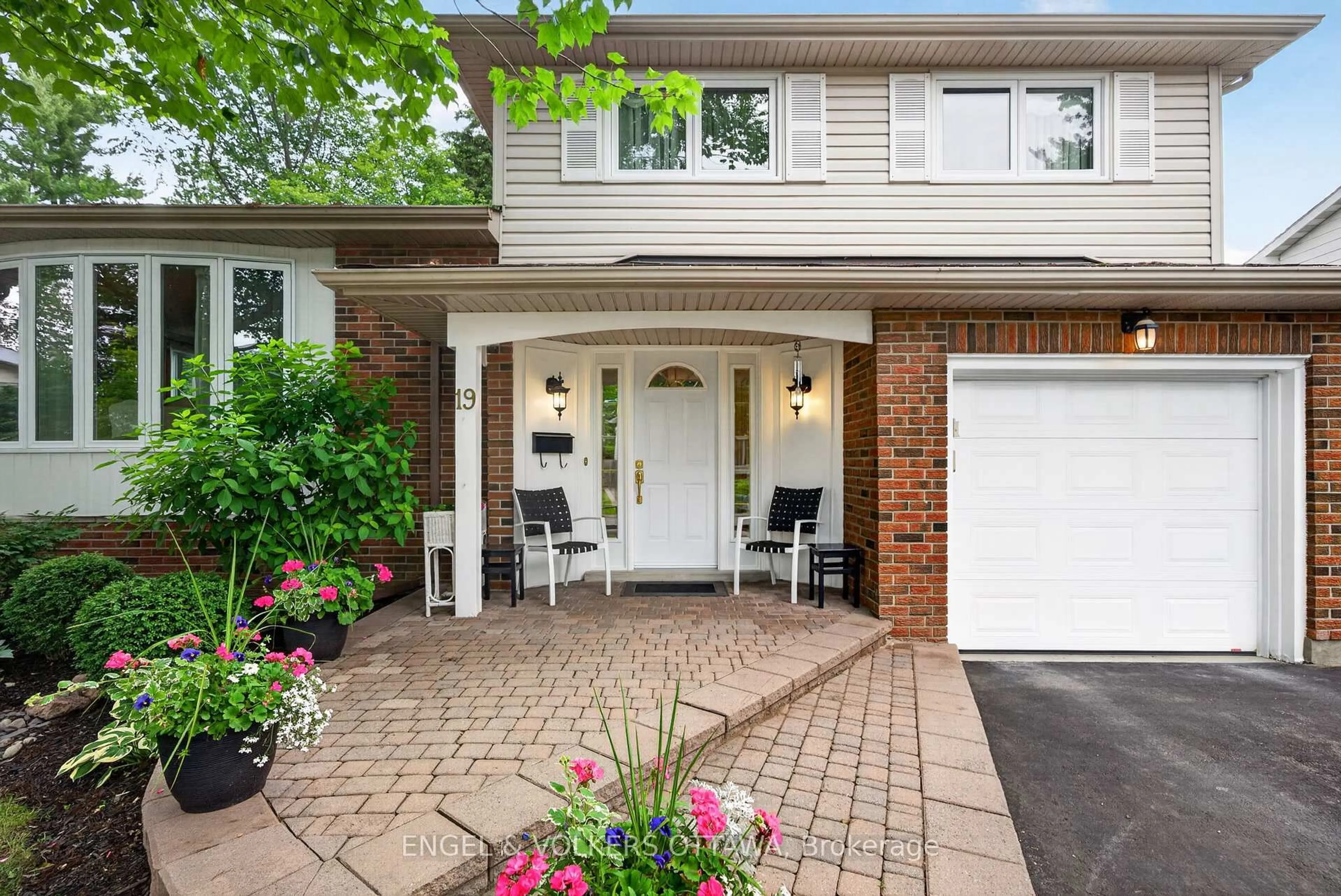 Home with brick exterior material, street for 19 Woodhill Cres, Ottawa Ontario K1B 3B7