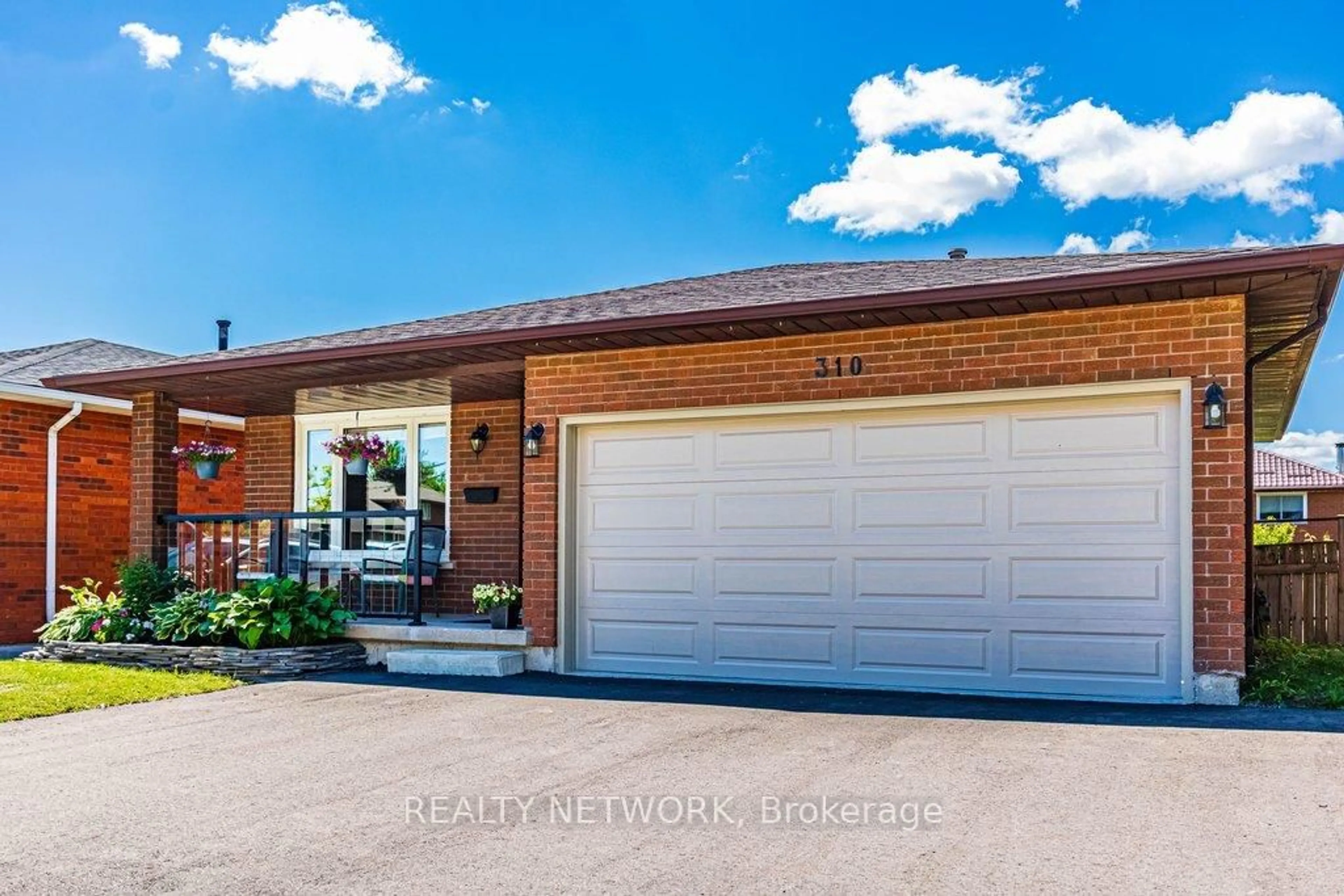 Home with brick exterior material, street for 310 Stone Church Rd, Hamilton Ontario L9B 1B2