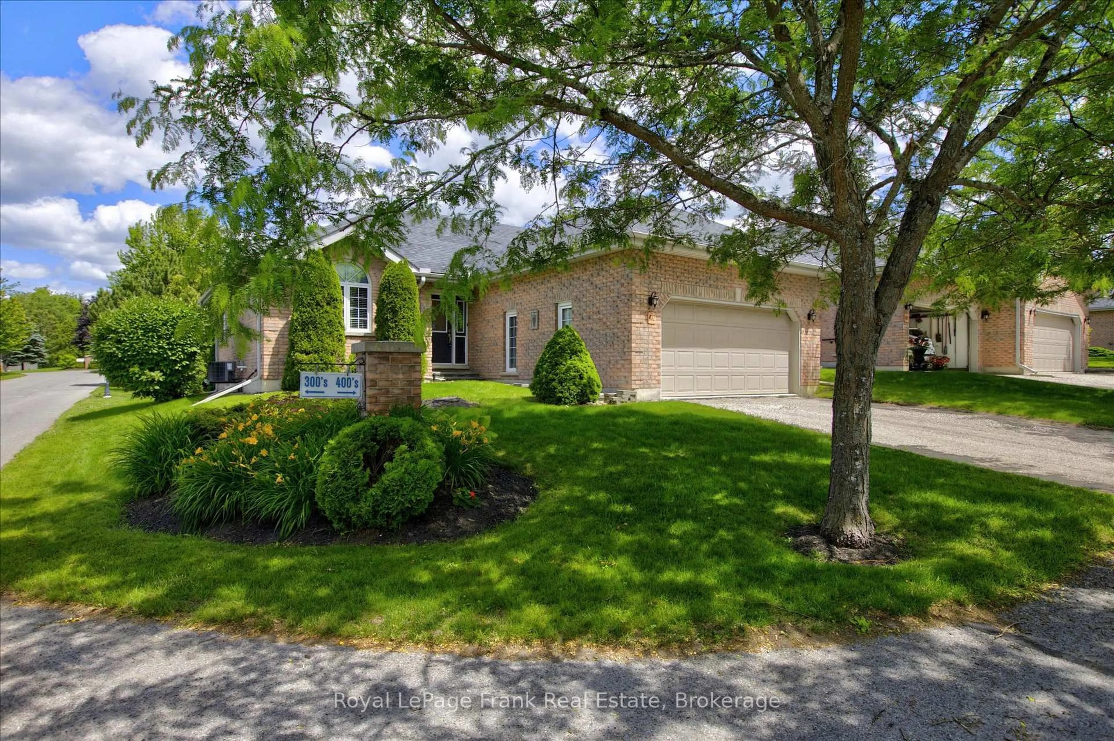 A pic from outside/outdoor area/front of a property/back of a property/a pic from drone, street for 1742 Ravenwood Dr #402, Peterborough Ontario K9K 2R5