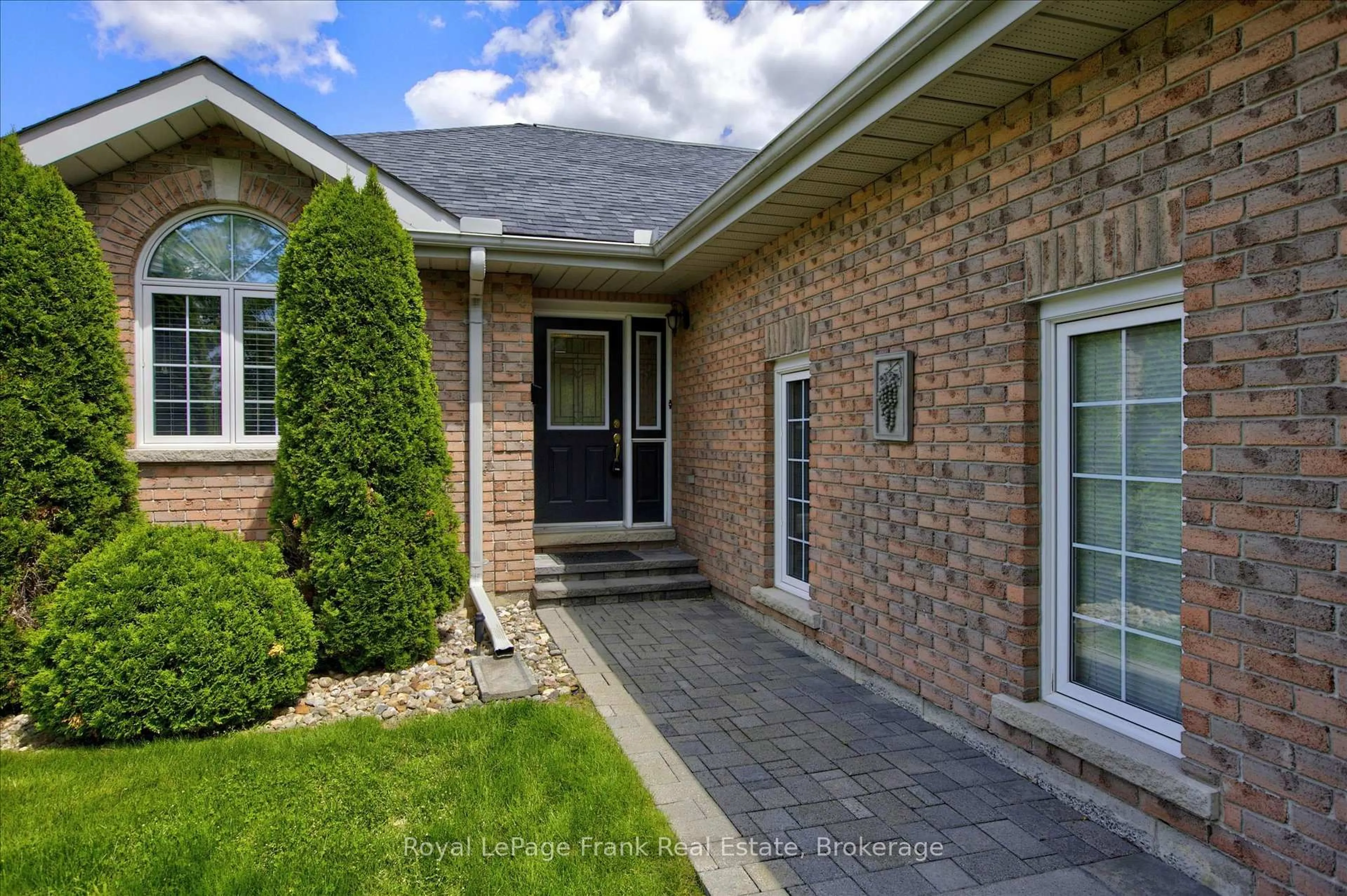Home with brick exterior material, street for 1742 Ravenwood Dr #402, Peterborough Ontario K9K 2R5