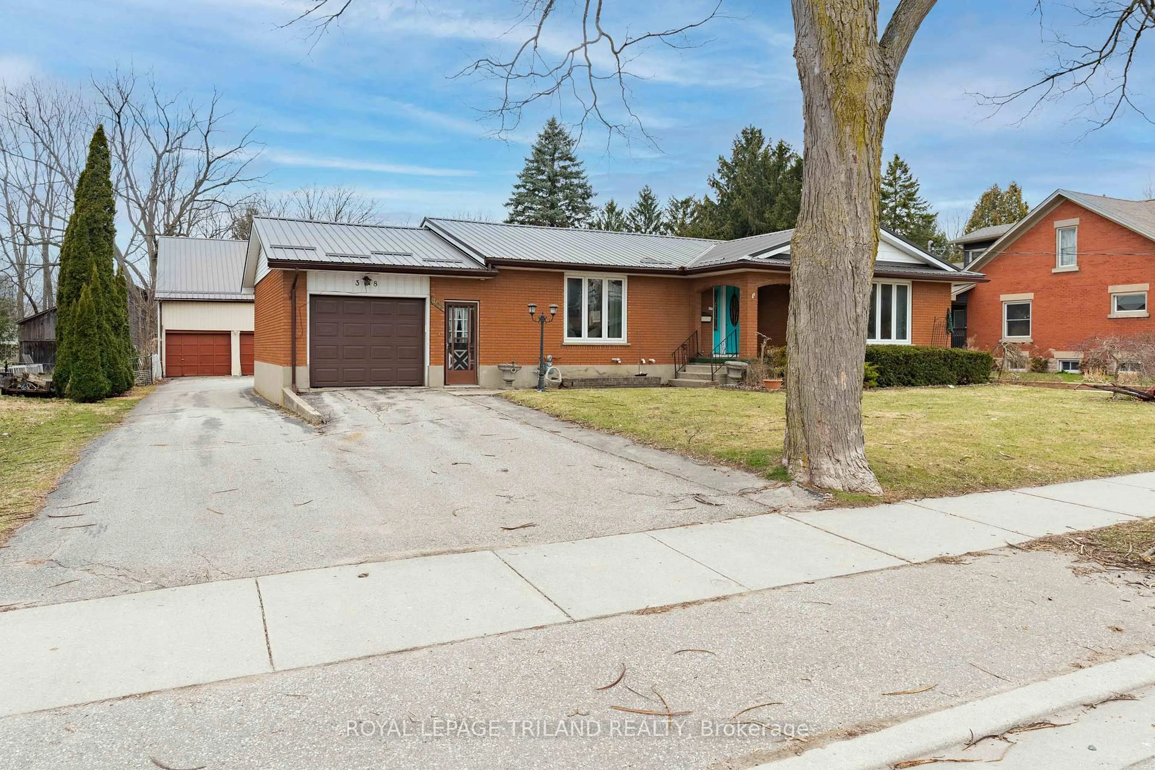 Home with brick exterior material, street for 308 John St, Aylmer Ontario N5H 2E2