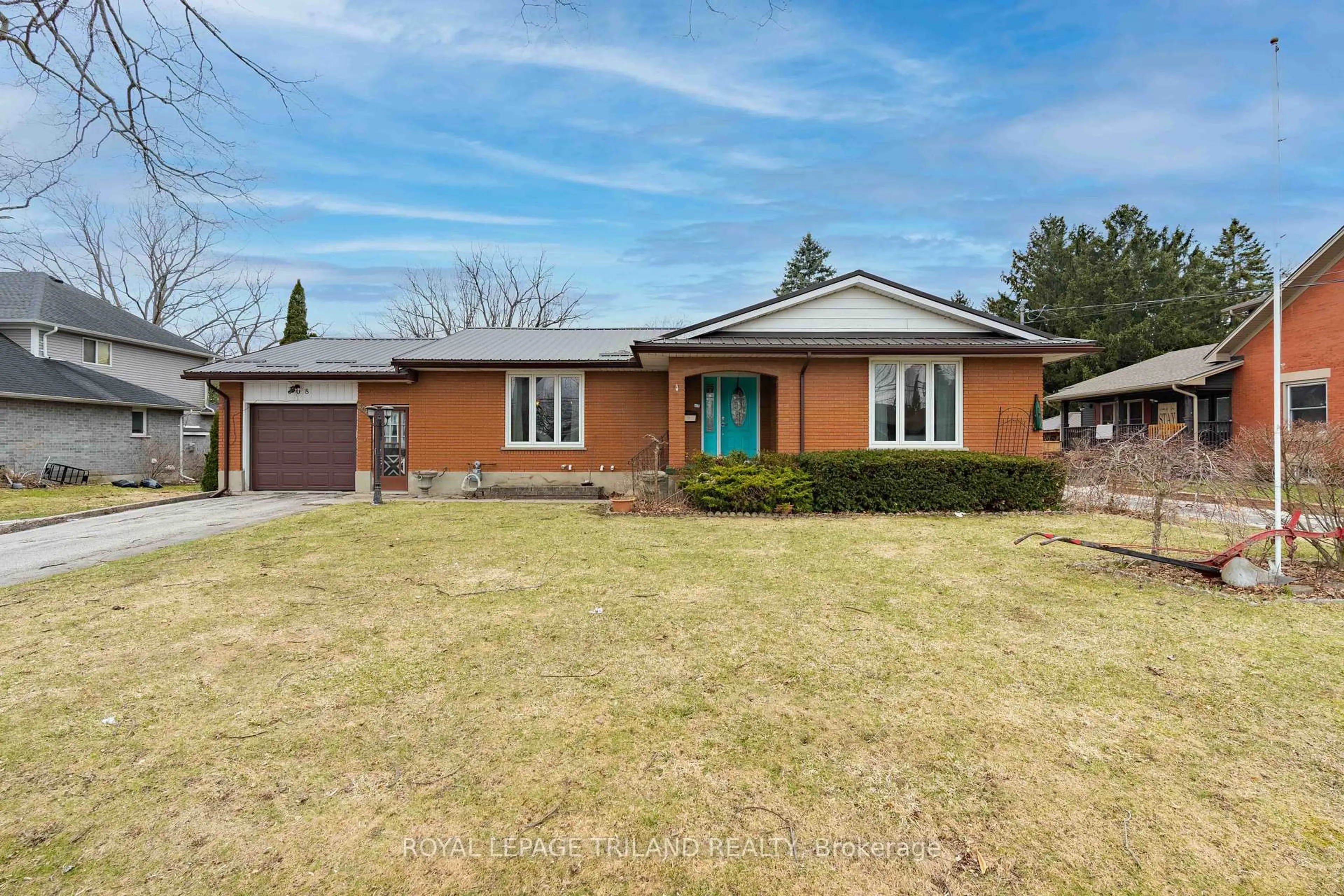 Home with brick exterior material, street for 308 John St, Aylmer Ontario N5H 2E2