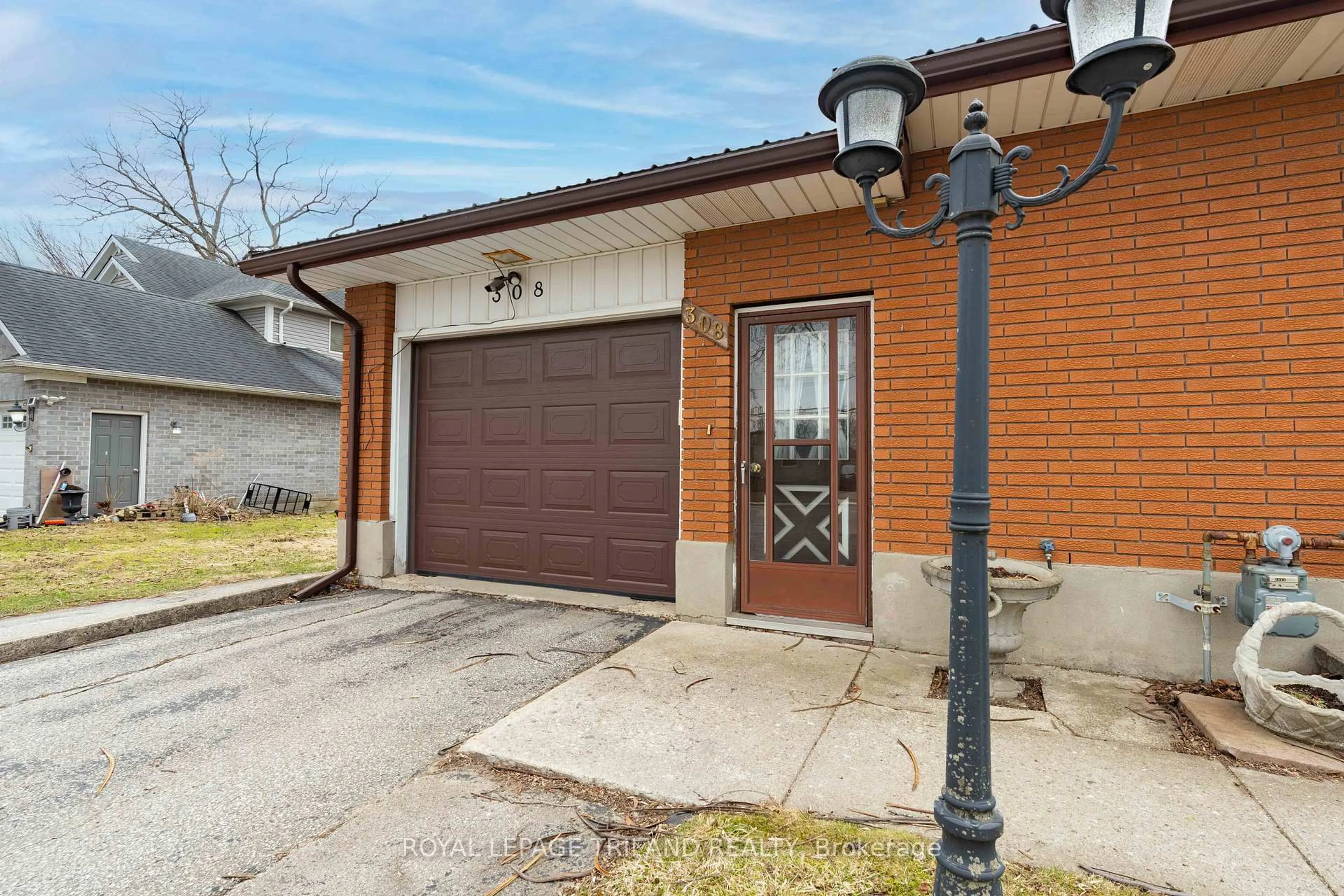 Home with brick exterior material, street for 308 John St, Aylmer Ontario N5H 2E2