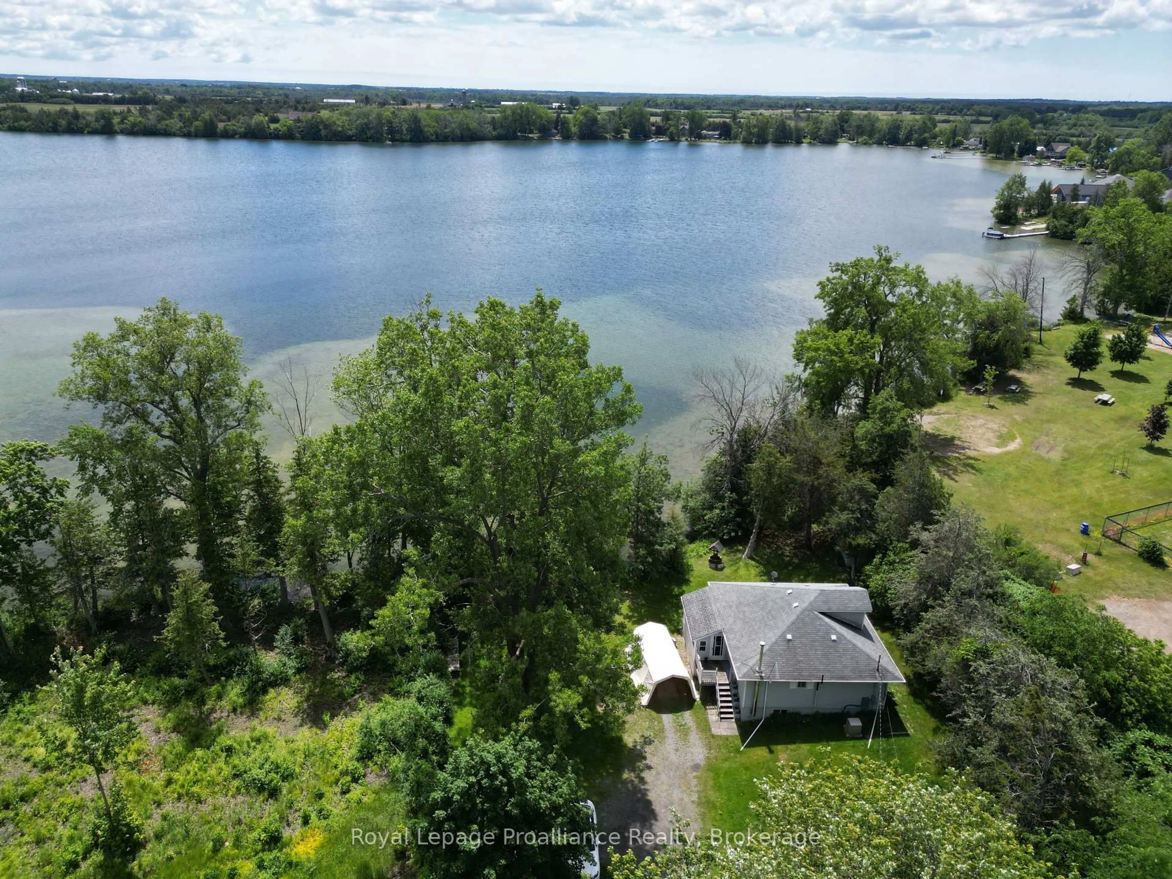 A pic from outside/outdoor area/front of a property/back of a property/a pic from drone, water/lake/river/ocean view for 473 County Rd 19 St, Prince Edward County Ontario K0K 2T0