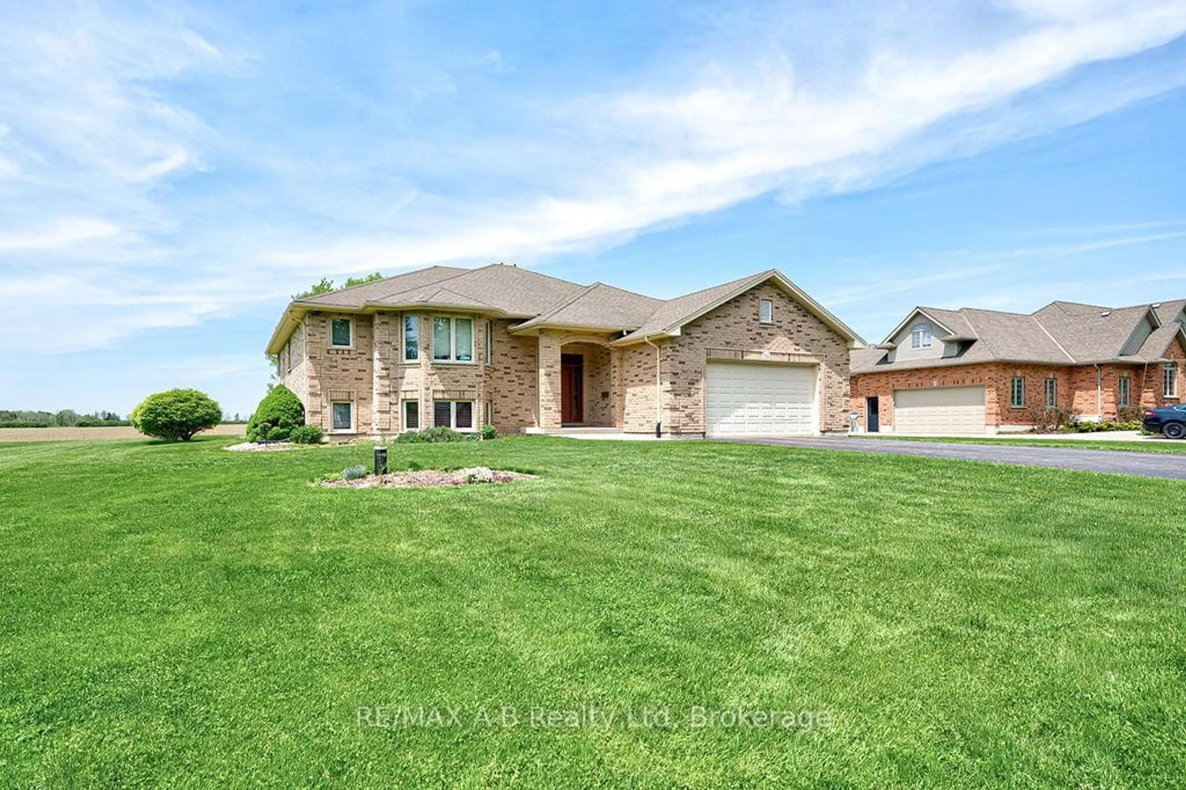 Home with brick exterior material, street for 194 Station Rd, Perth South Ontario N0K 1X0