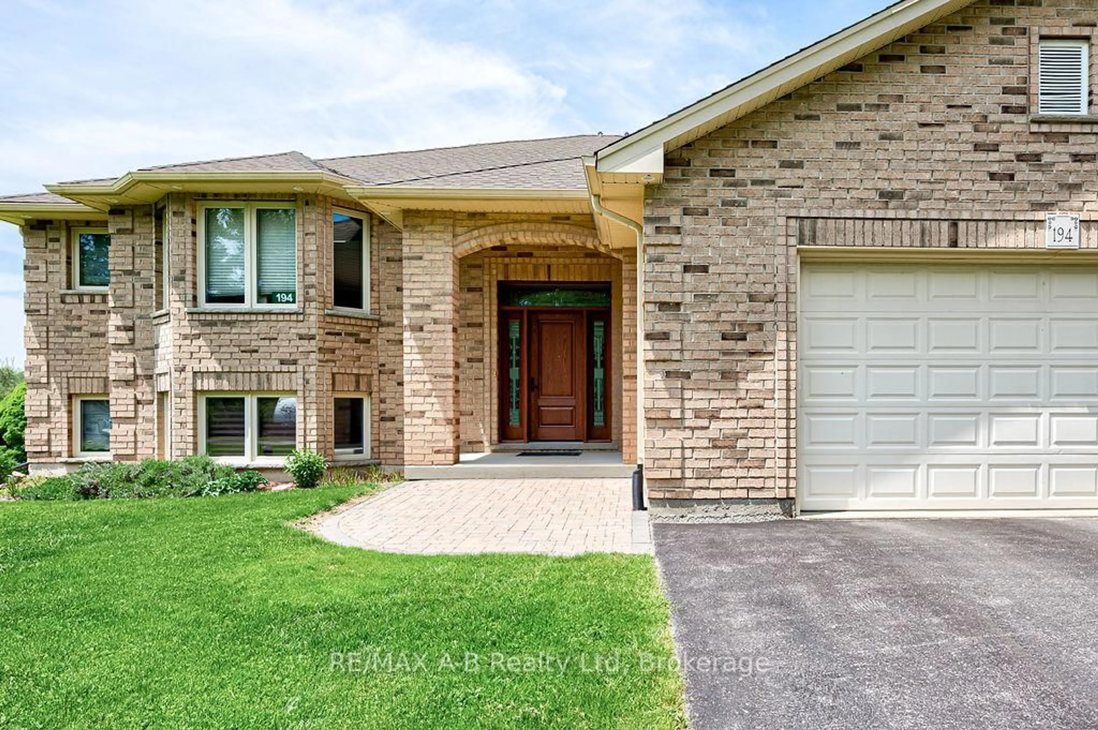 Home with brick exterior material, street for 194 Station Rd, Perth South Ontario N0K 1X0