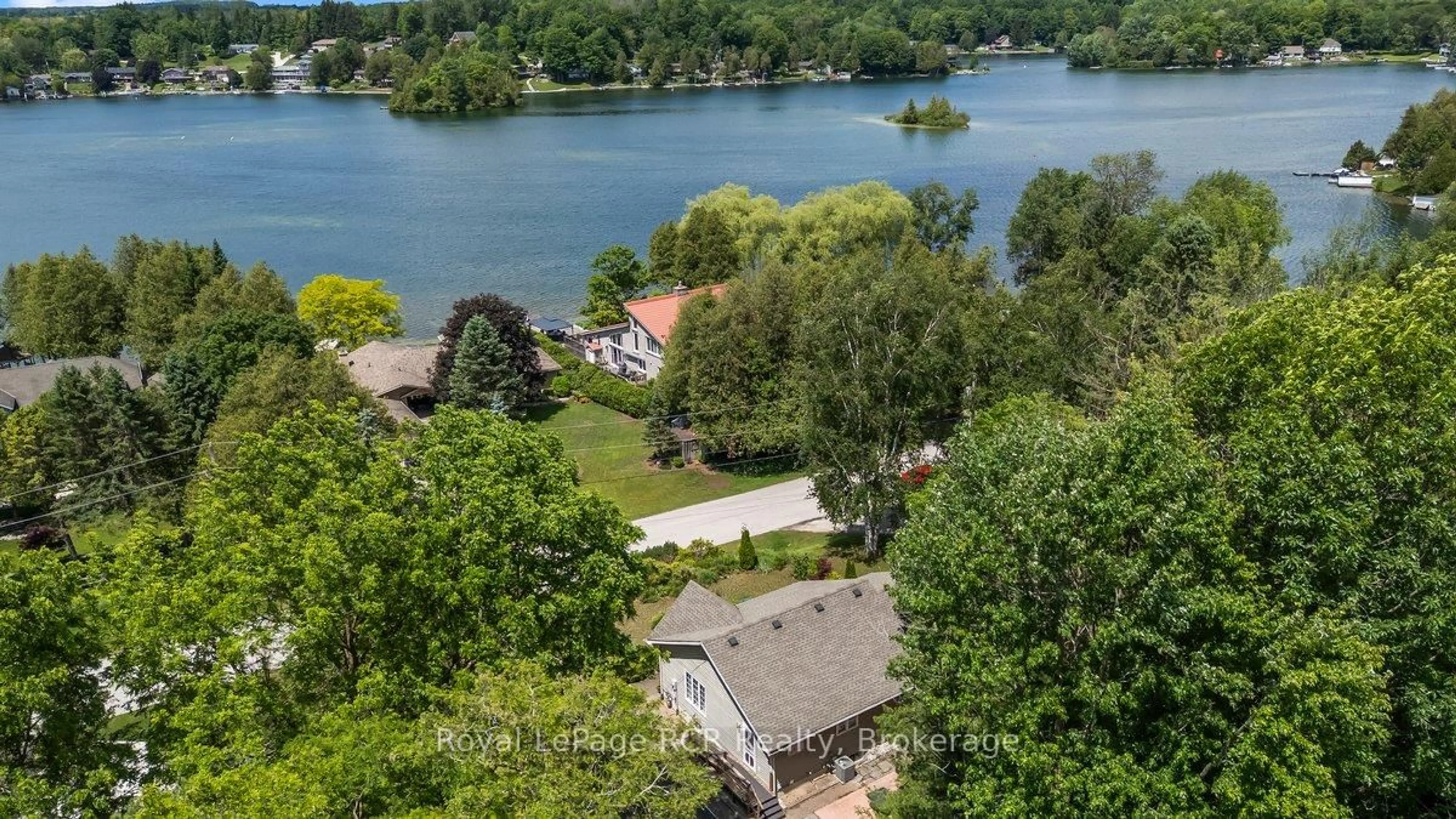 A pic from outside/outdoor area/front of a property/back of a property/a pic from drone, water/lake/river/ocean view for 137 Lake Rosalind 1 Rd, Brockton Ontario N4N 3B9