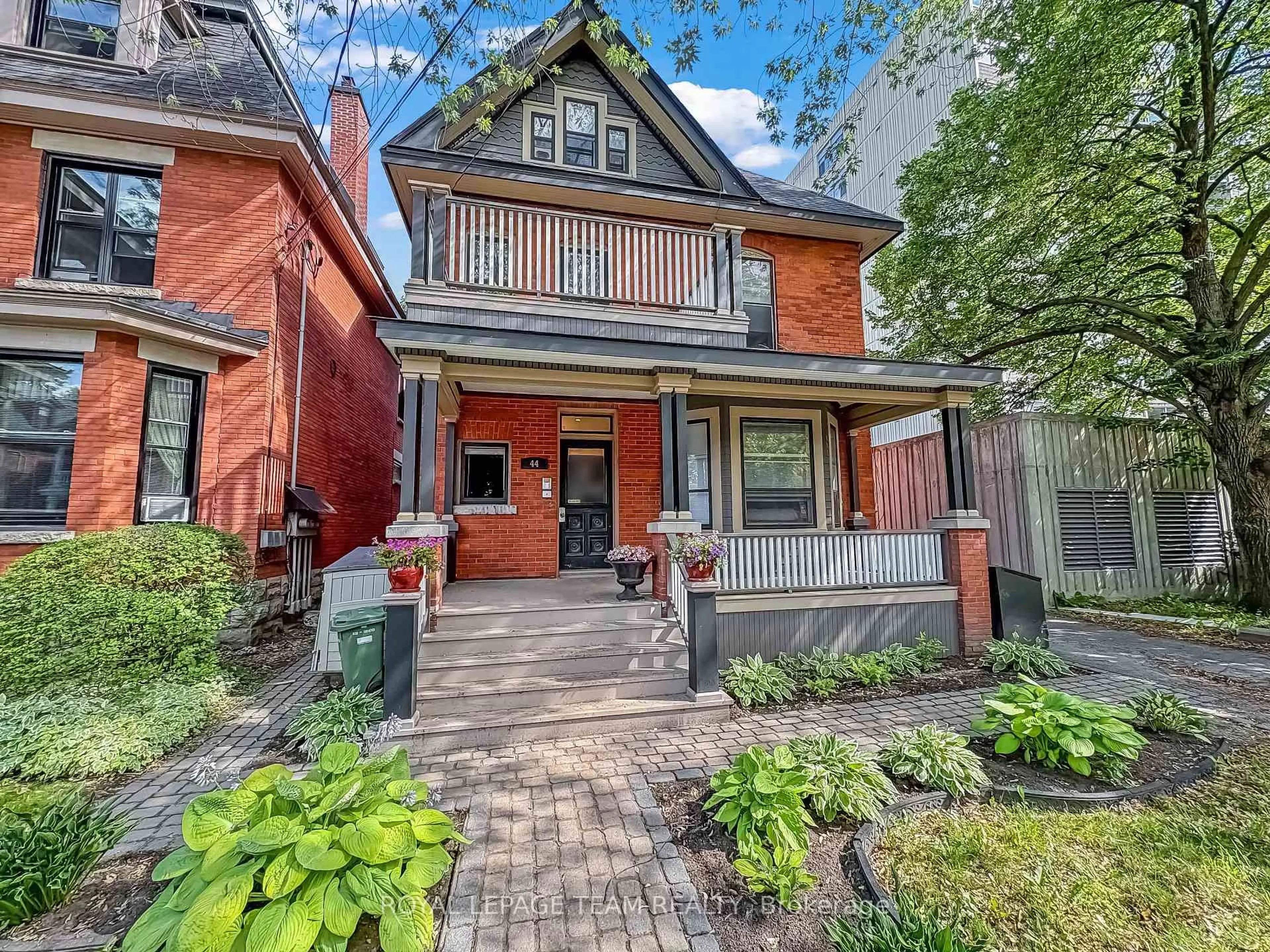 Home with brick exterior material, street for 44 Mcleod St, Ottawa Ontario K2P 0Z5