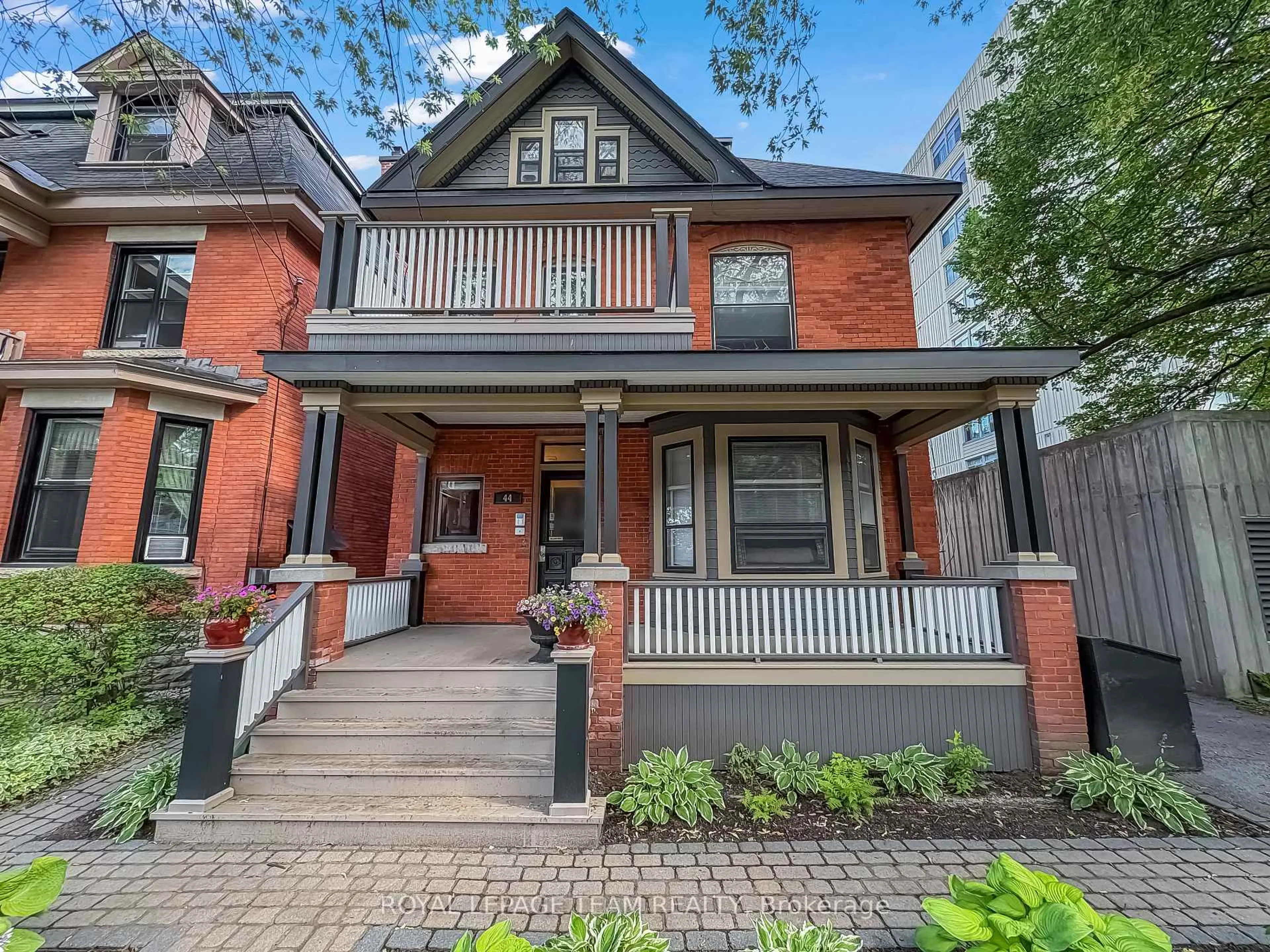 Home with brick exterior material, street for 44 Mcleod St, Ottawa Ontario K2P 0Z5