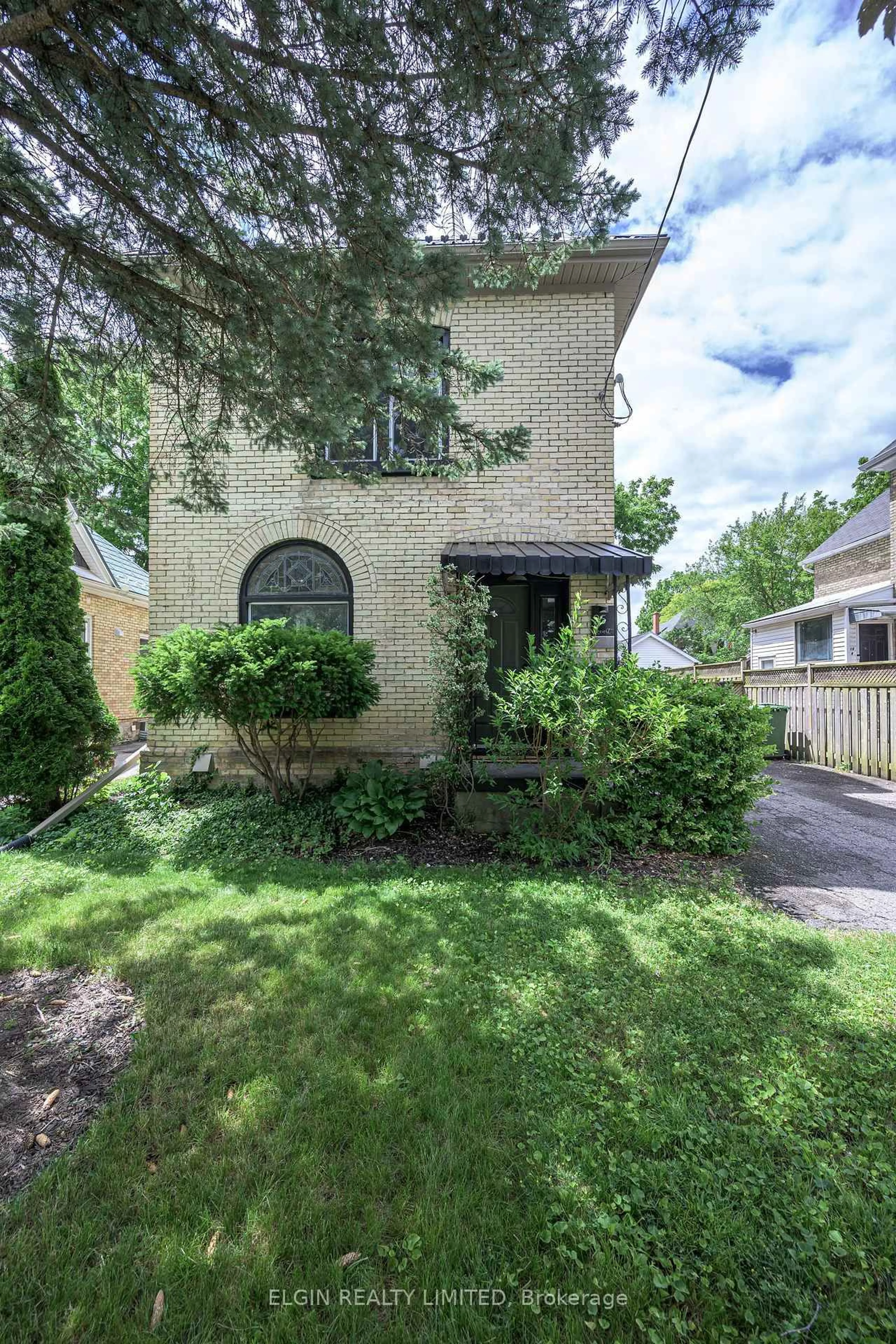 Home with brick exterior material, street for 25 Locust St, St. Thomas Ontario N5R 2C2