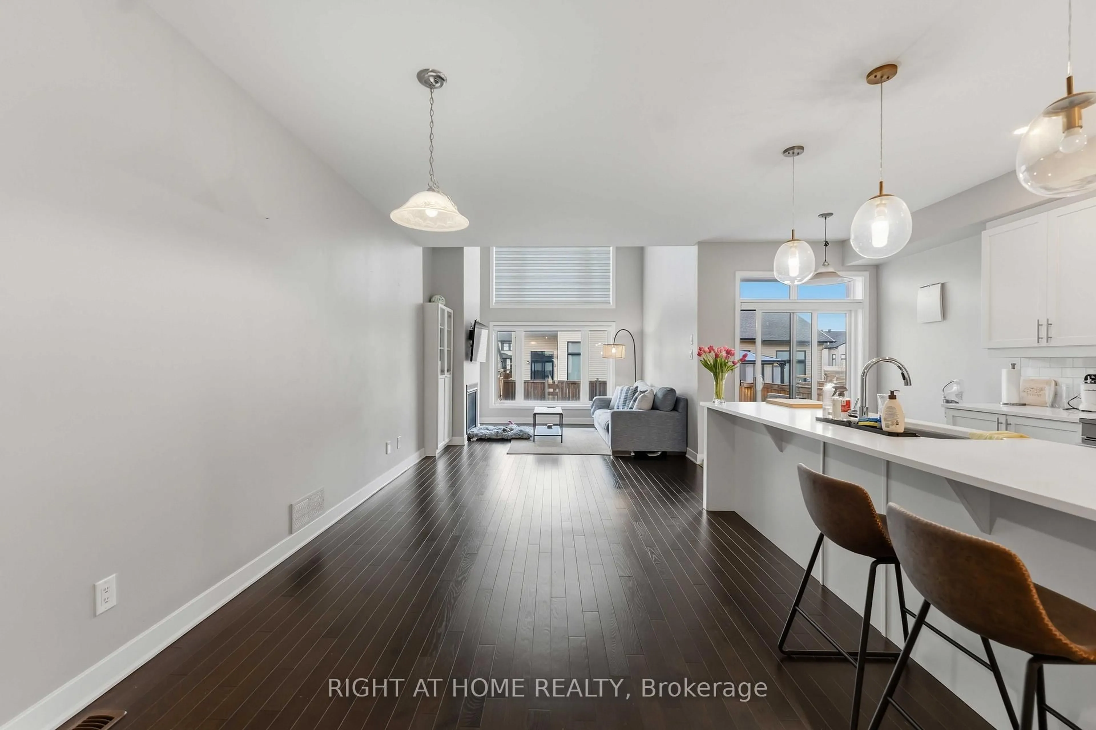 Open concept kitchen, wood/laminate floor for 424 Markdale Terr, Ottawa Ontario K1X 0B2