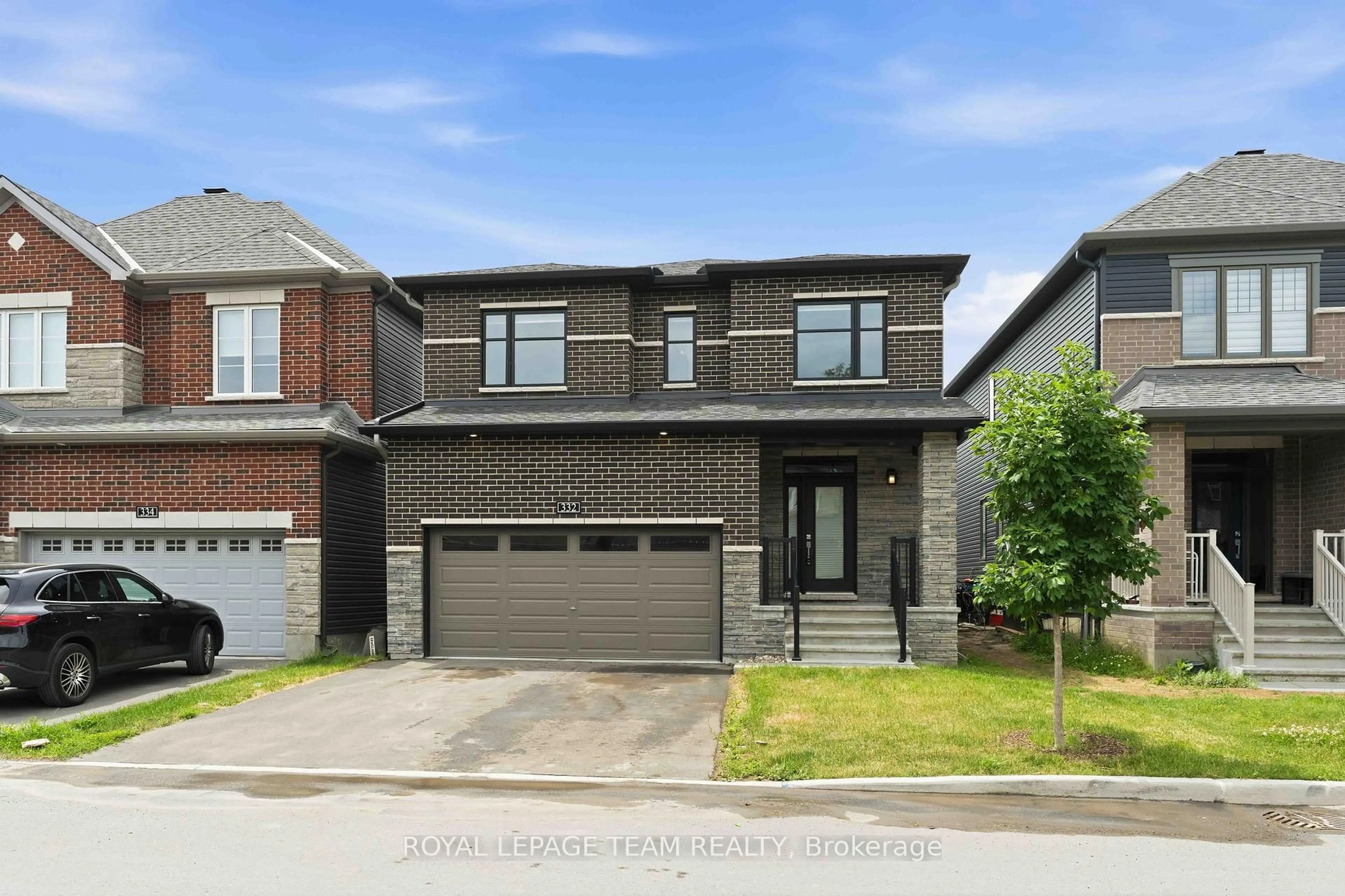 Home with brick exterior material, street for 332 Elsie Macgill Walk, Kanata Ontario K2W 0K7