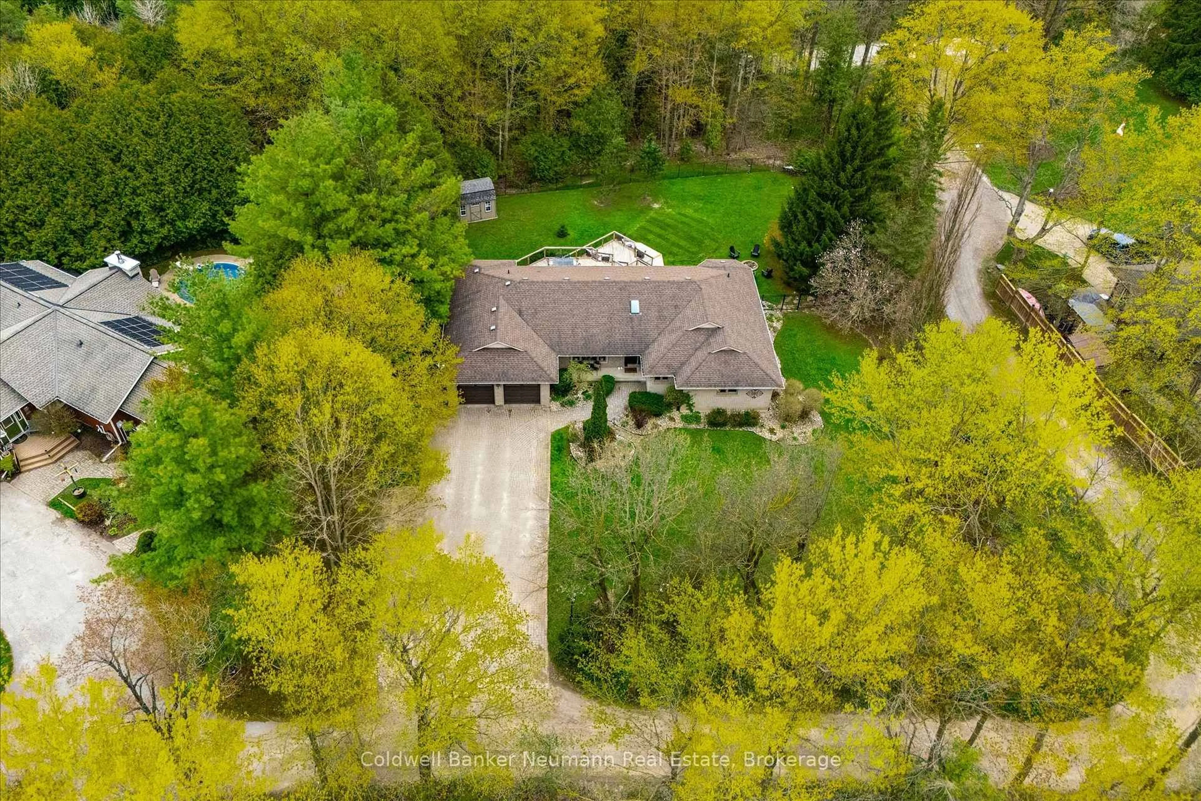 A pic from outside/outdoor area/front of a property/back of a property/a pic from drone, forest/trees view for 25 Riverview Dr, Centre Wellington Ontario N0B 1S0