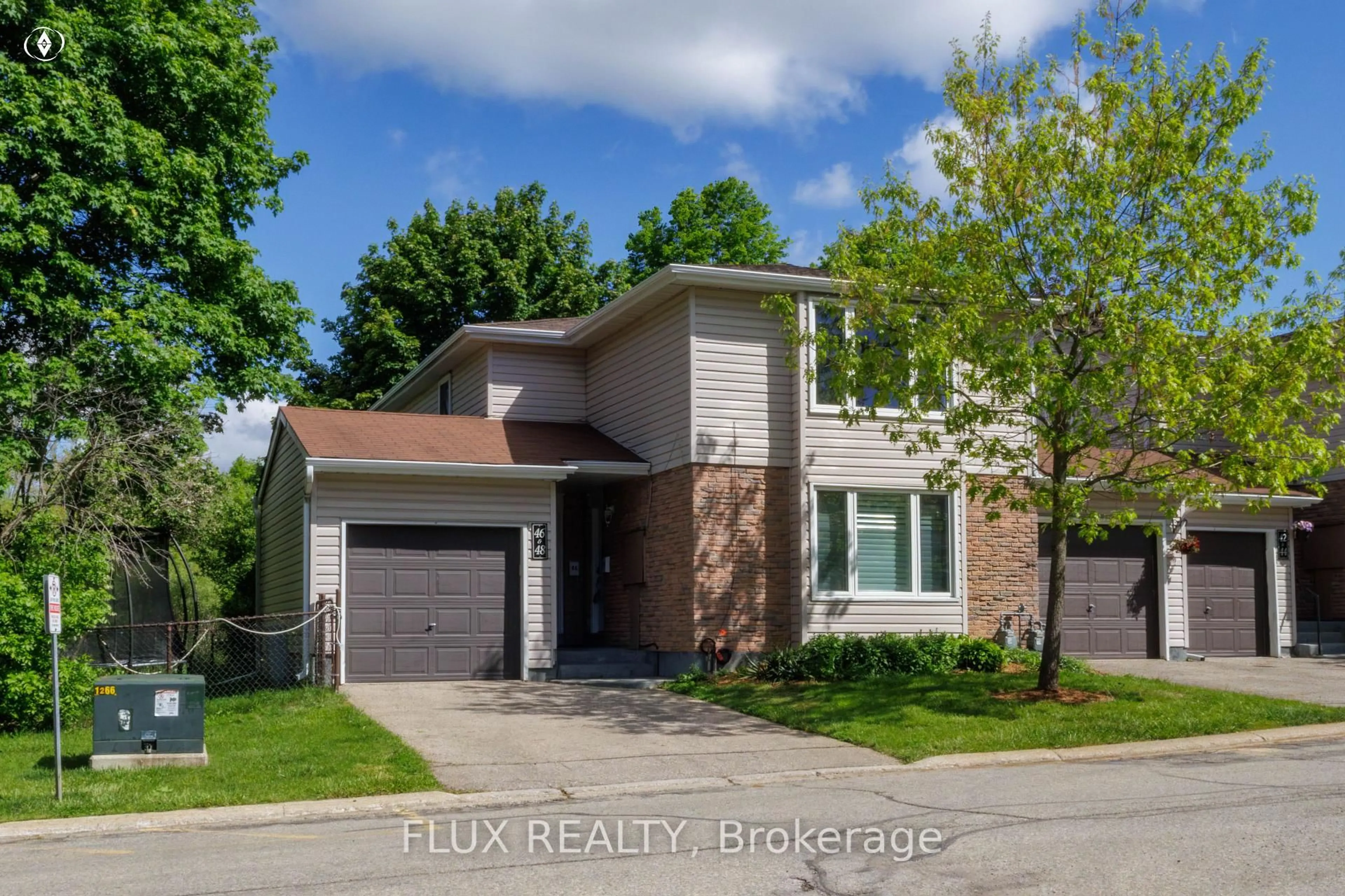 Home with brick exterior material, street for 175 Elm Ridge Dr #48, Kitchener Ontario N2N 1L7