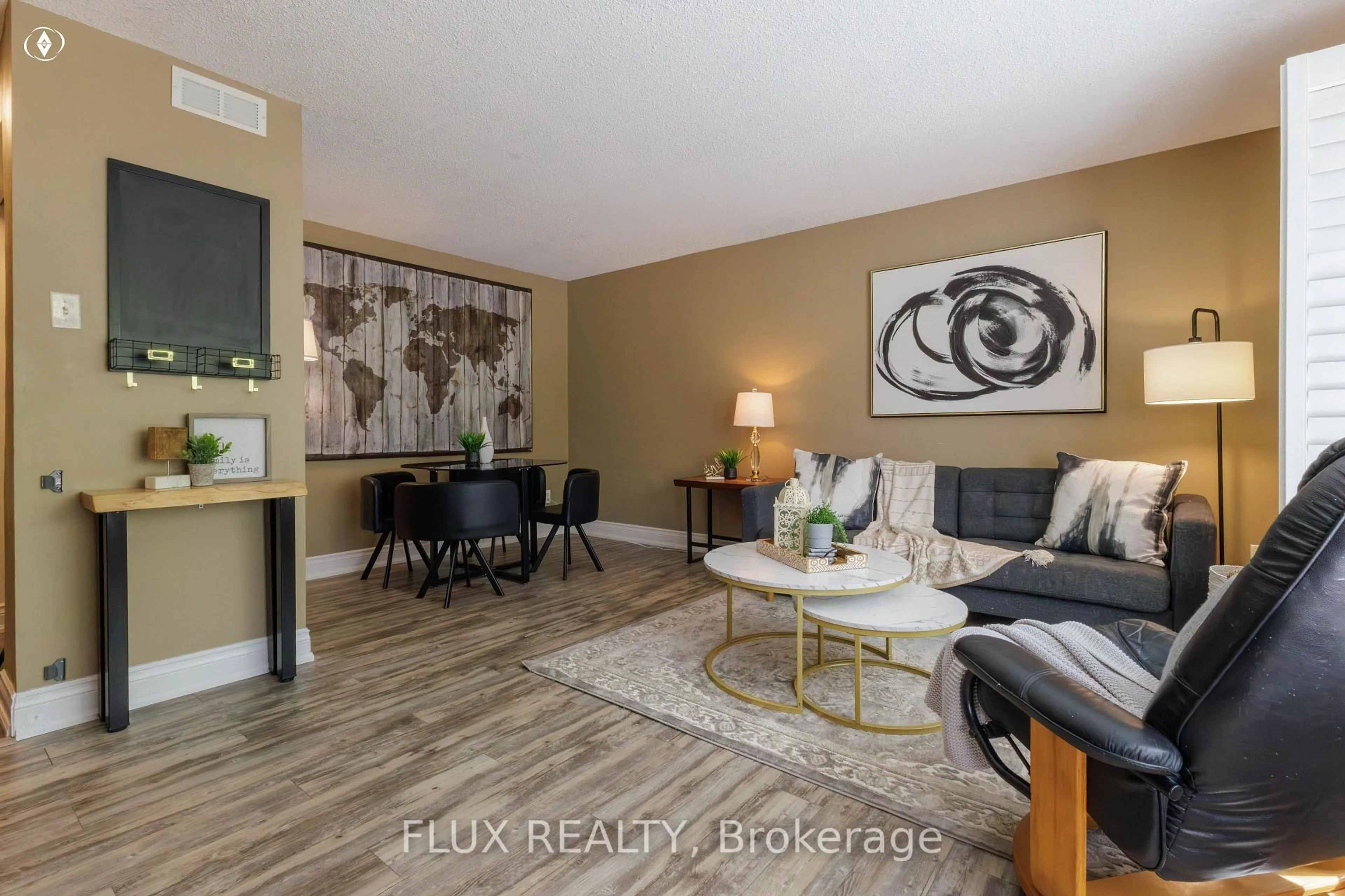 Living room with furniture, wood/laminate floor for 175 Elm Ridge Dr #48, Kitchener Ontario N2N 1L7