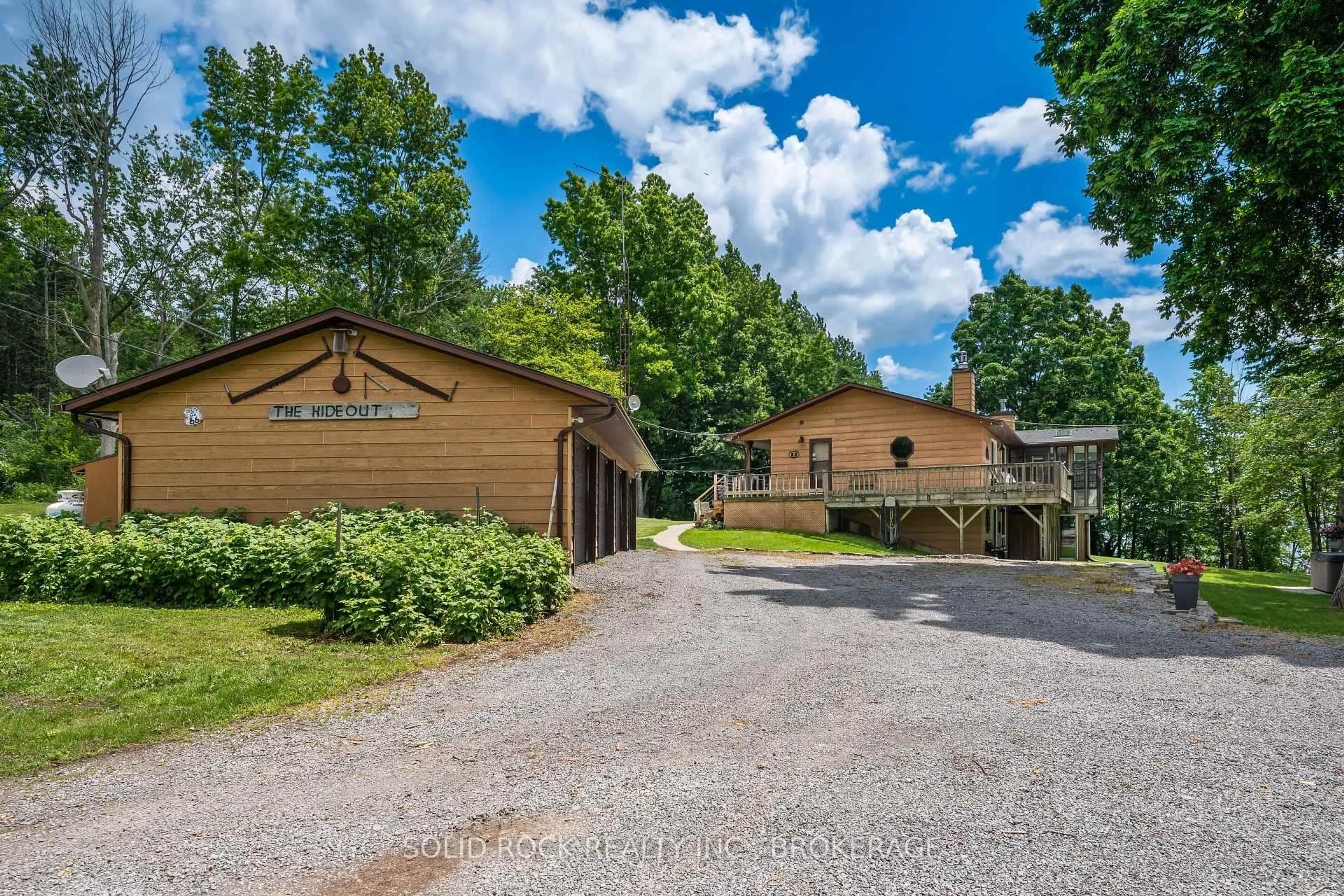 A pic from outside/outdoor area/front of a property/back of a property/a pic from drone, mountain view for 220 Havenwood Tr, Gananoque Ontario K7G 2V6