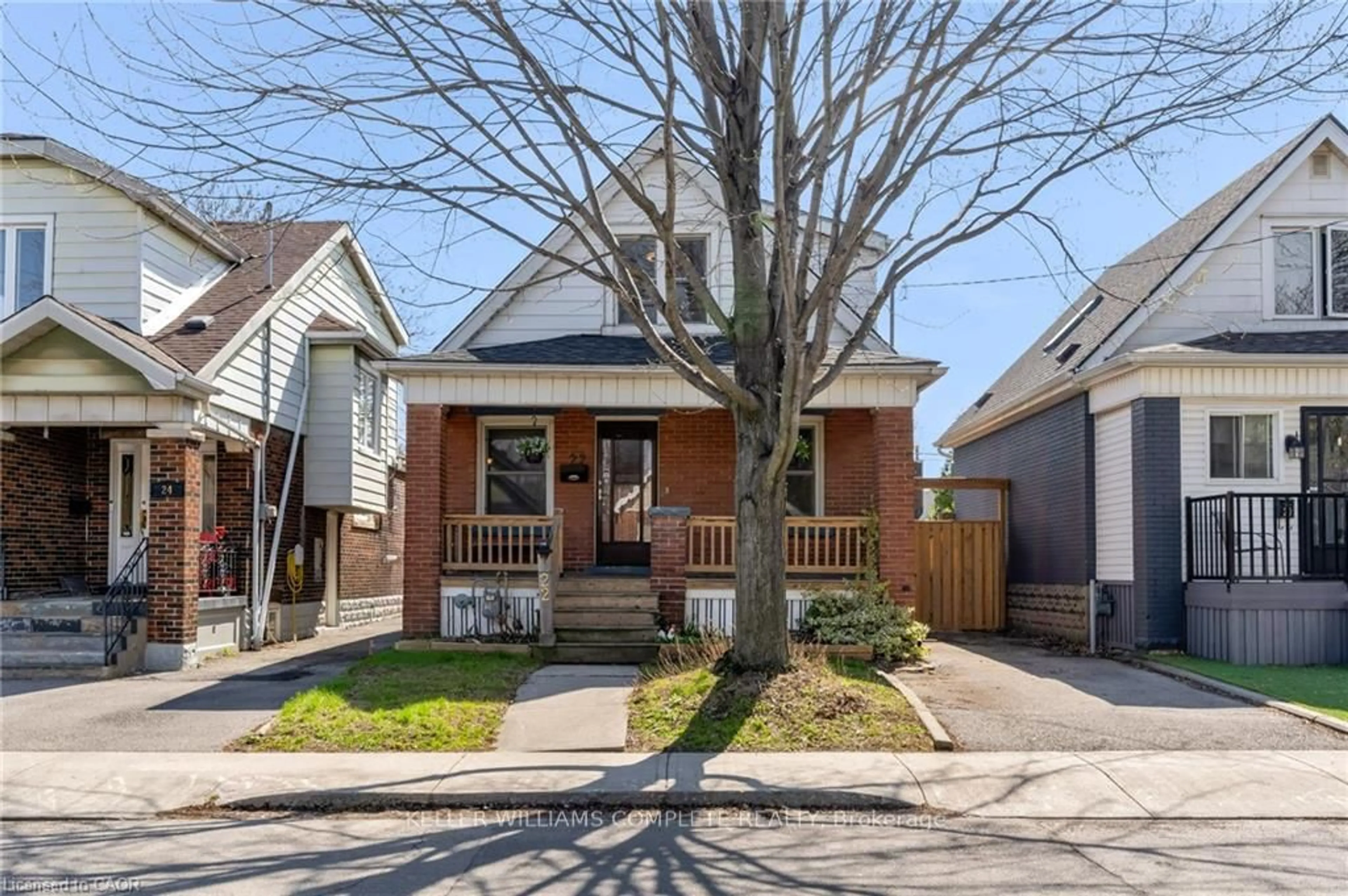 Home with brick exterior material, street for 22 COPE St, Hamilton Ontario L8H 5A9