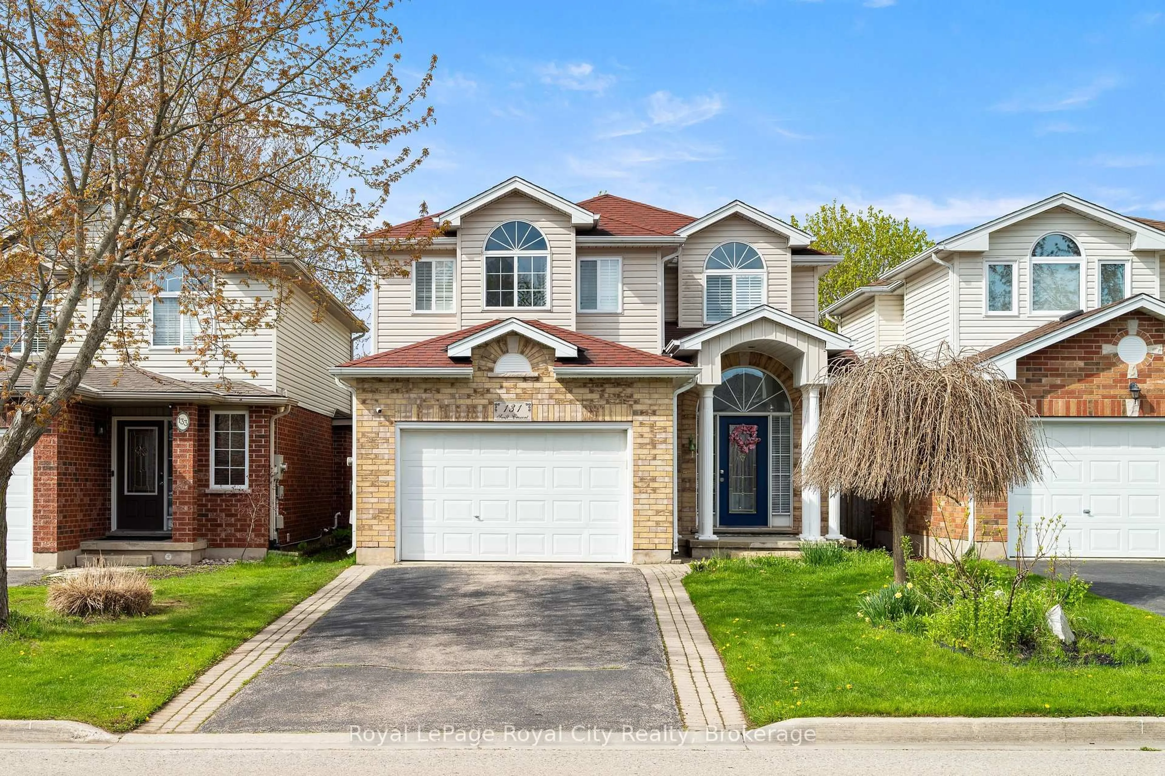 Home with brick exterior material, street for 131 Swift Cres, Guelph Ontario N1E 7J2