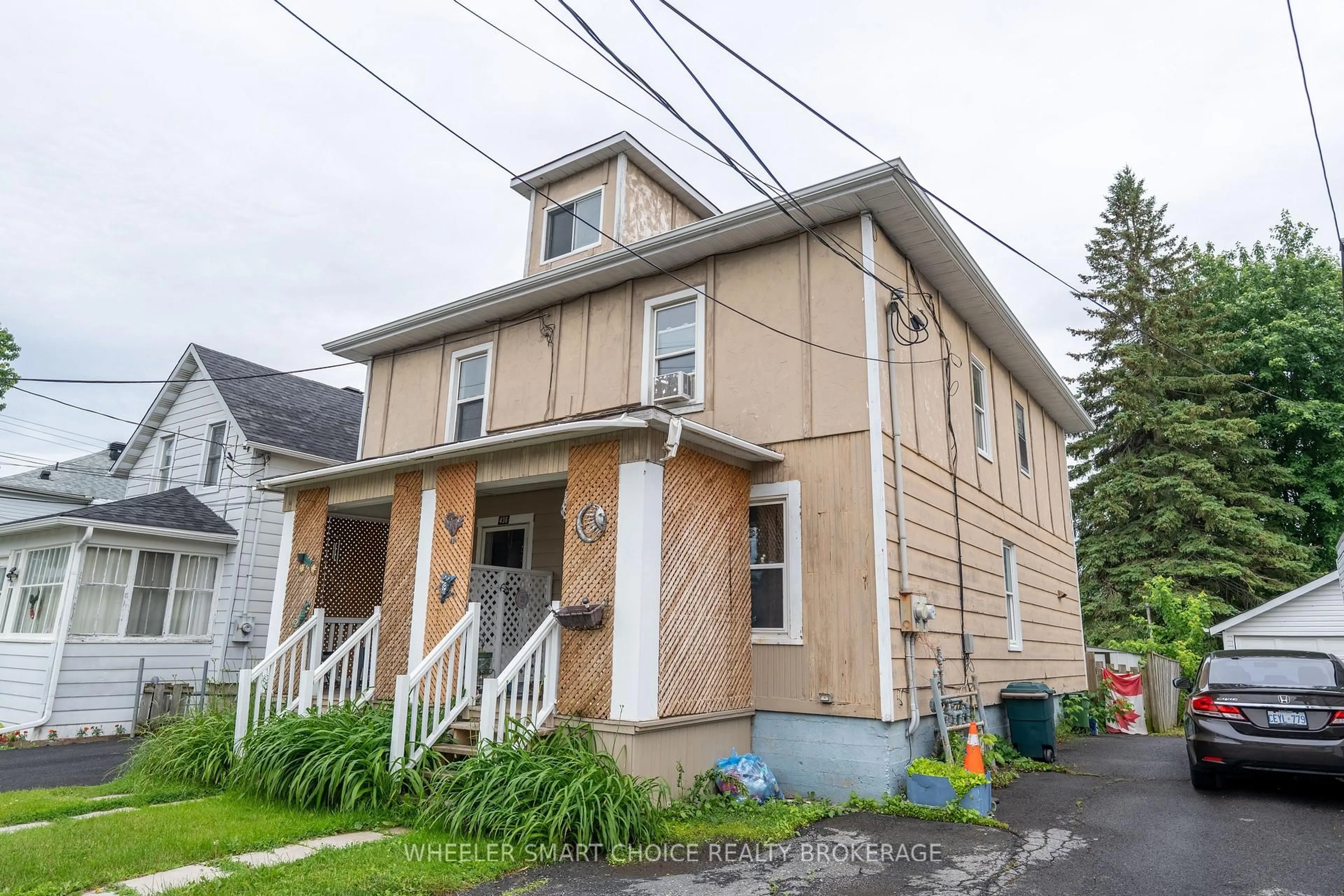 Home with vinyl exterior material, street for 434-436 5th St, Cornwall Ontario K6H 2M2
