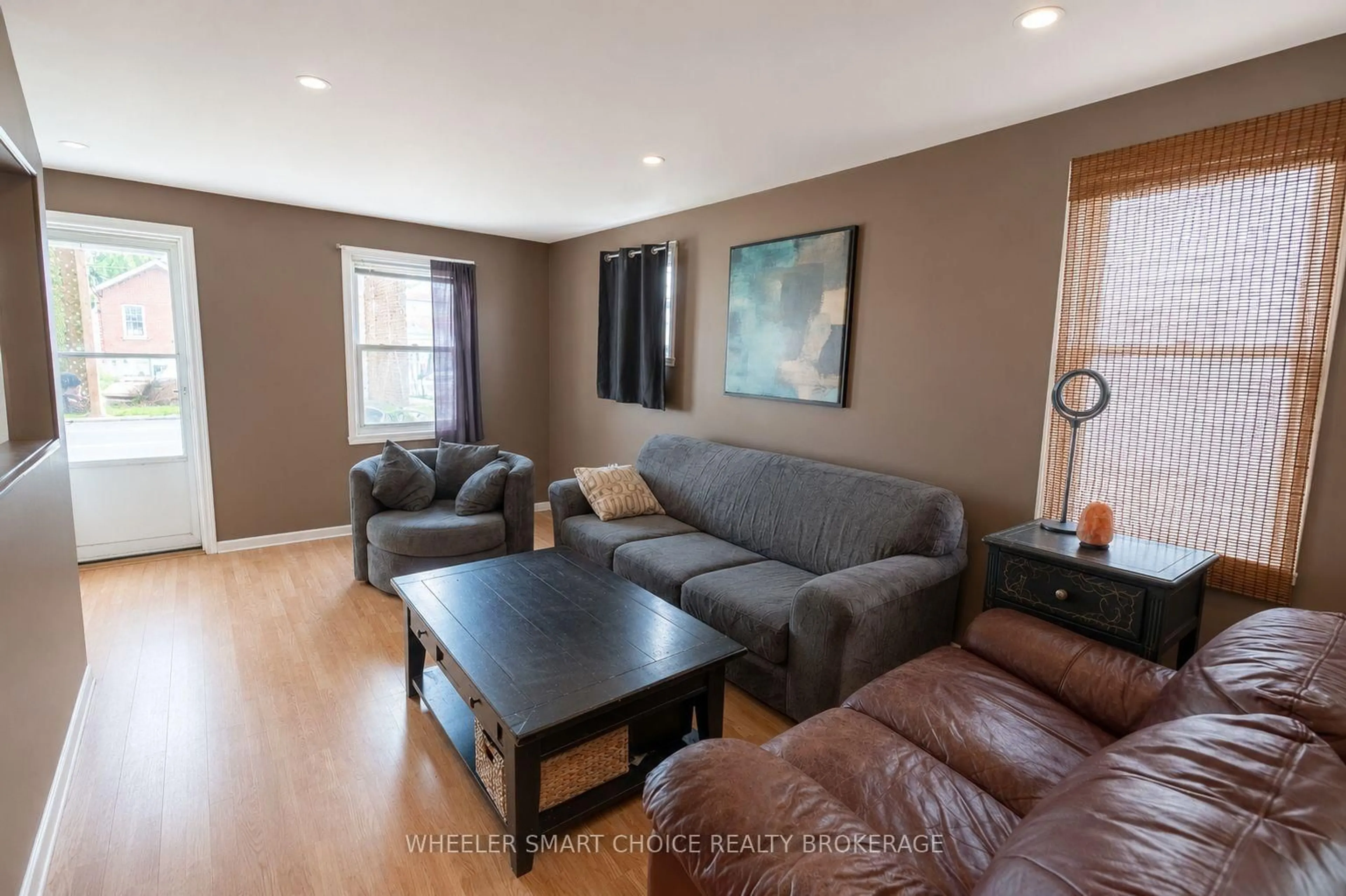 Living room with furniture, wood/laminate floor for 434-436 5th St, Cornwall Ontario K6H 2M2
