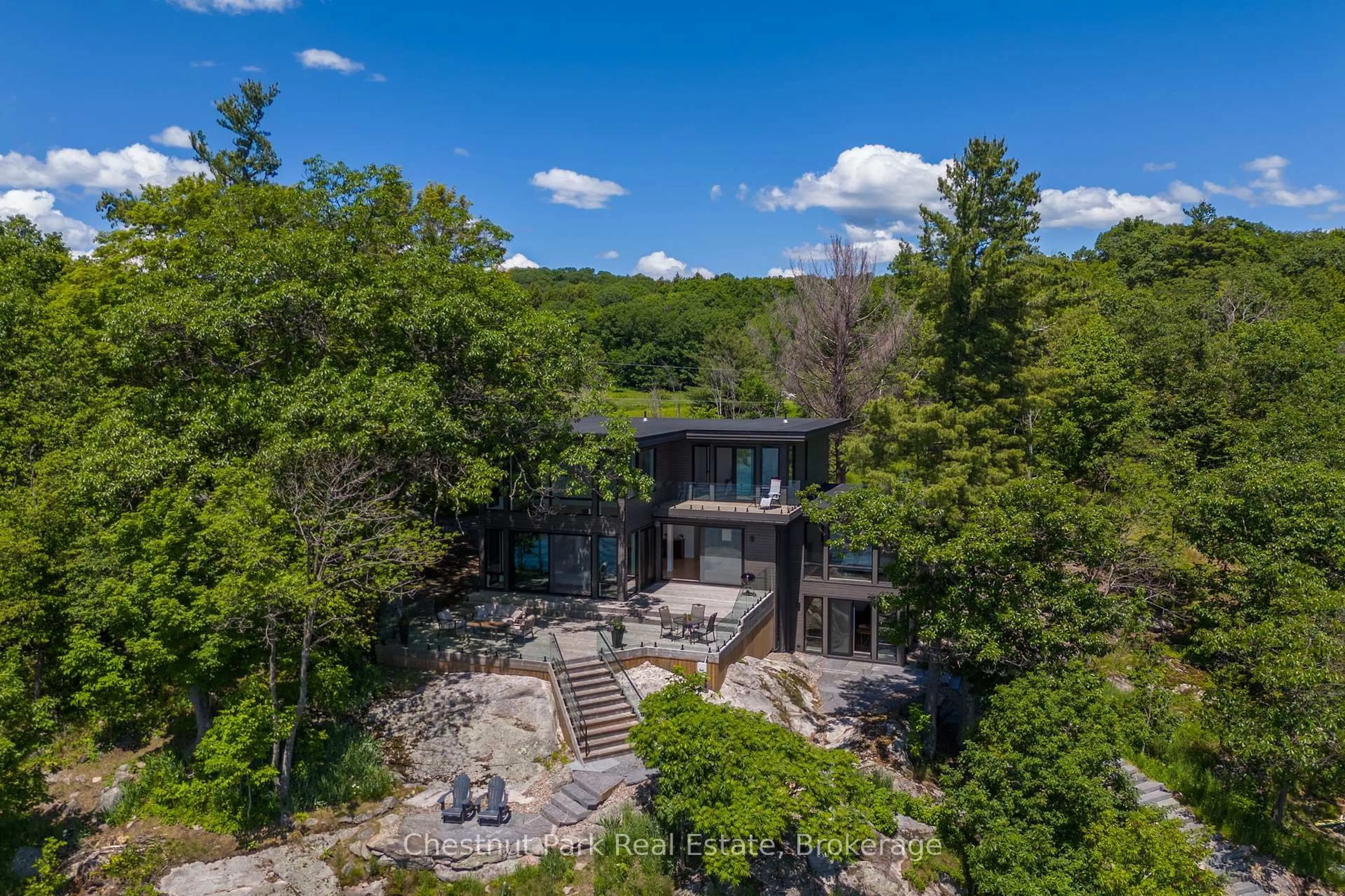 A pic from outside/outdoor area/front of a property/back of a property/a pic from drone, water/lake/river/ocean view for 1330 Road 2 Rd #17, Muskoka Lakes Ontario N9Y 2E4