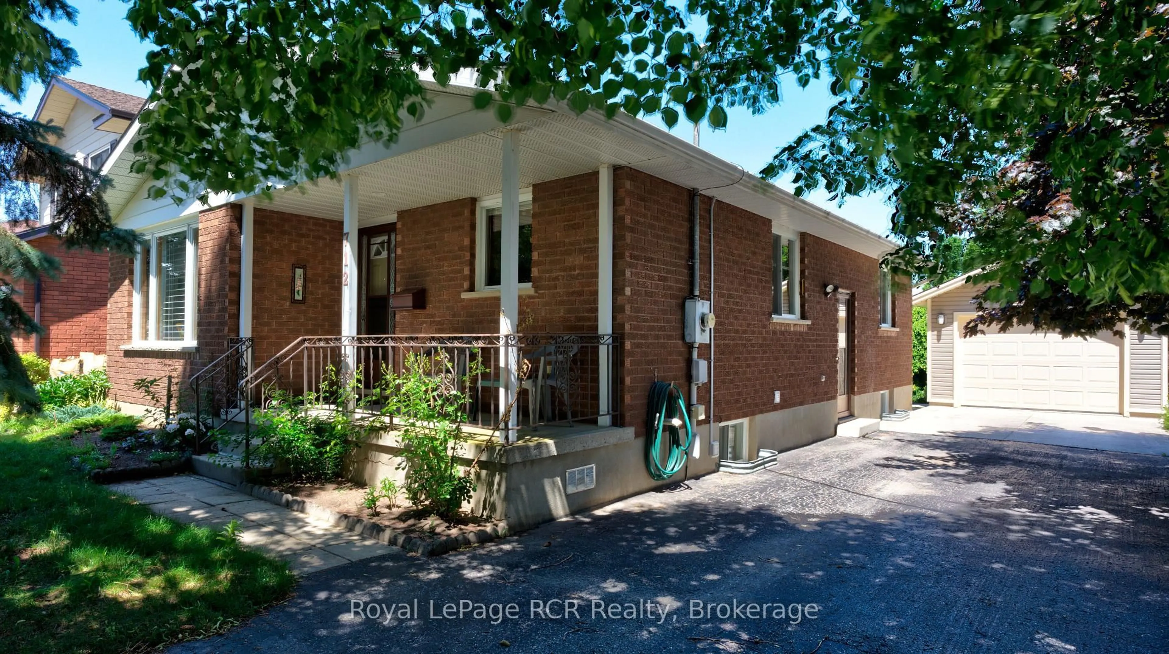 Home with brick exterior material, building for 712 16th St, Hanover Ontario N4N 3M3