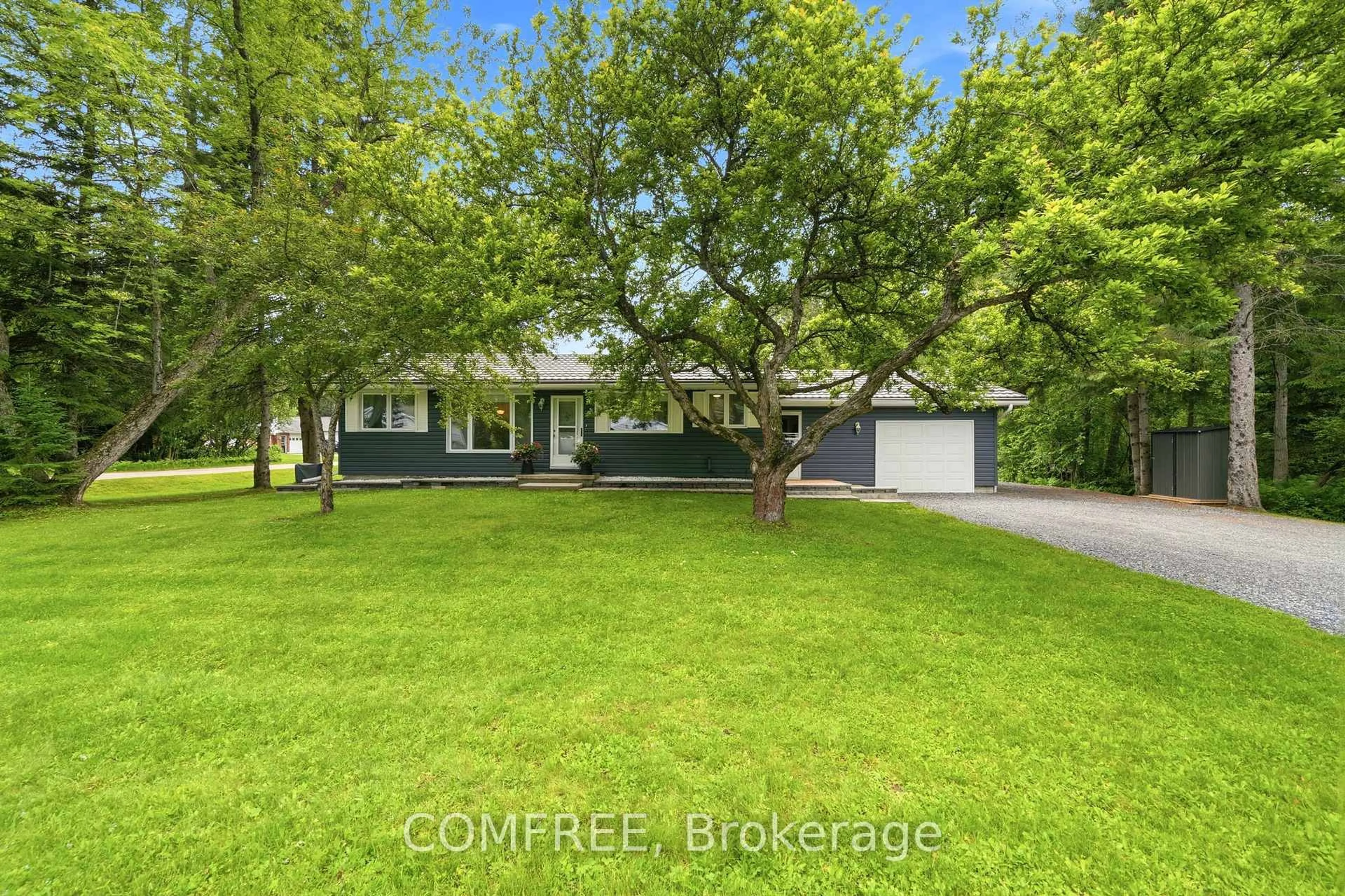 A pic from outside/outdoor area/front of a property/back of a property/a pic from drone, street for 9 Stouffer St St, Minden Hills Ontario K0M 2K0