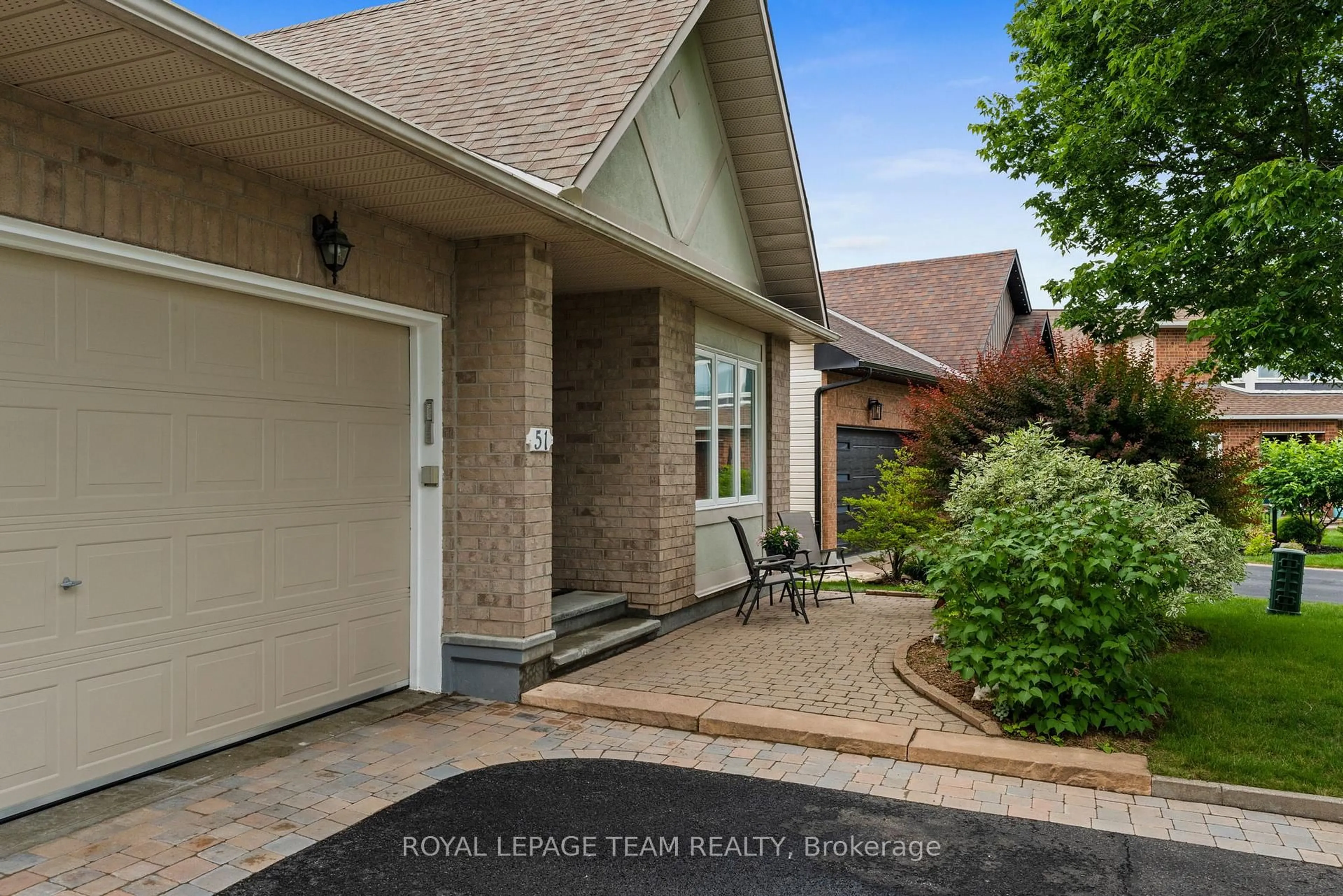 Home with brick exterior material, street for 51 Settler's Ridge Way, Ottawa Ontario K2J 4V2