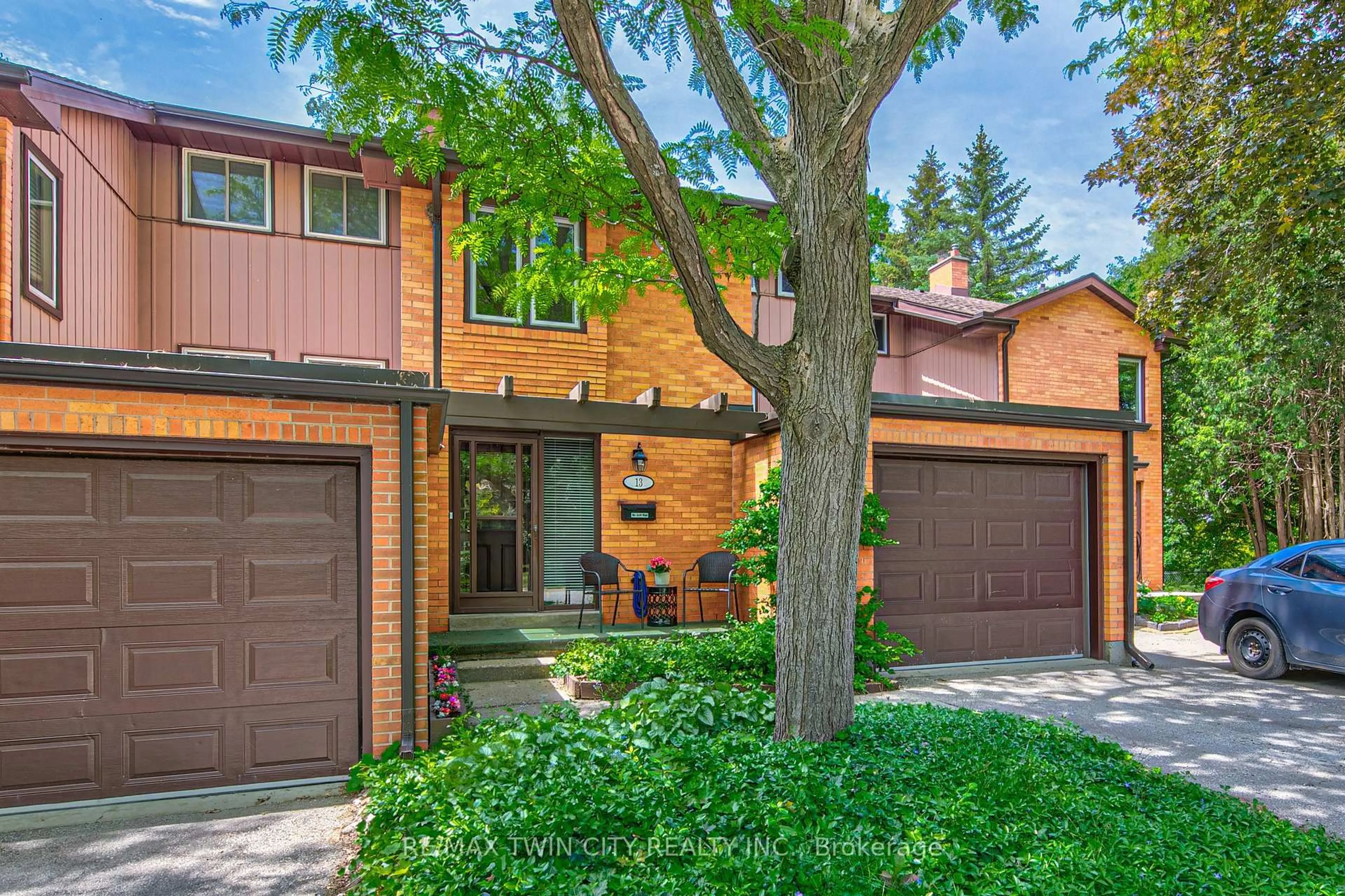 Home with brick exterior material, street for 206 Candlewood Cres #13, Waterloo Ontario N2L 5Y9