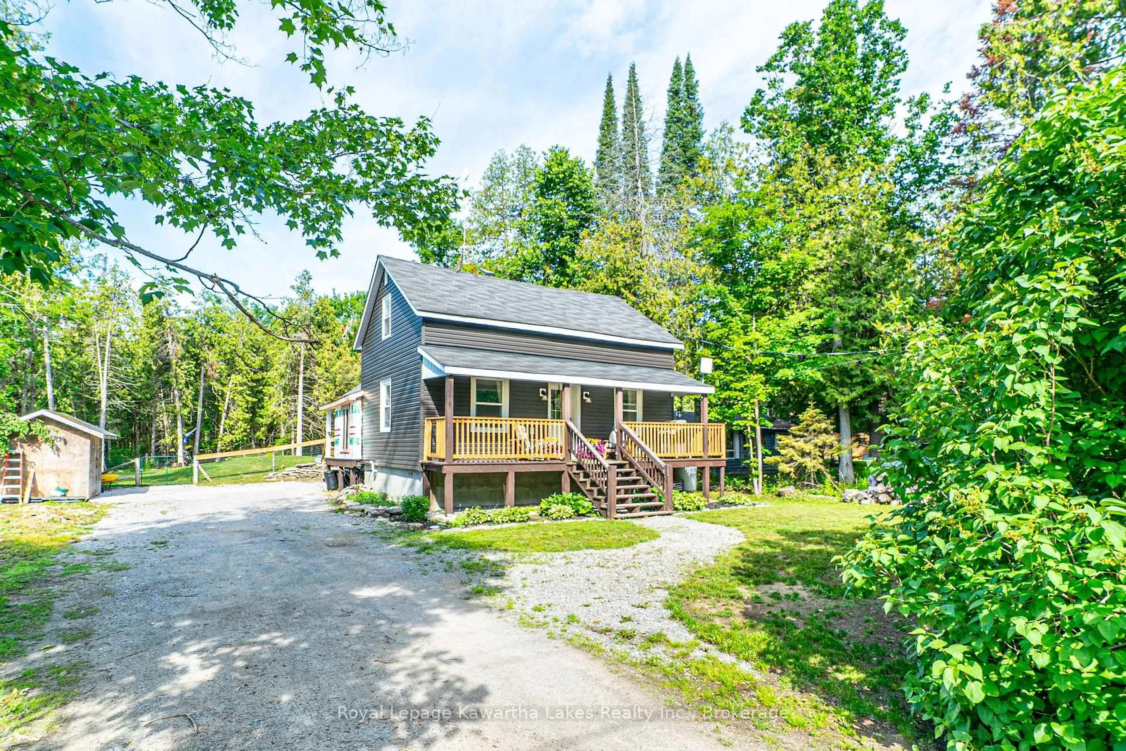 A pic from outside/outdoor area/front of a property/back of a property/a pic from drone, street for 112 Echo Bay Rd, Kawartha Lakes Ontario K0M 1A0