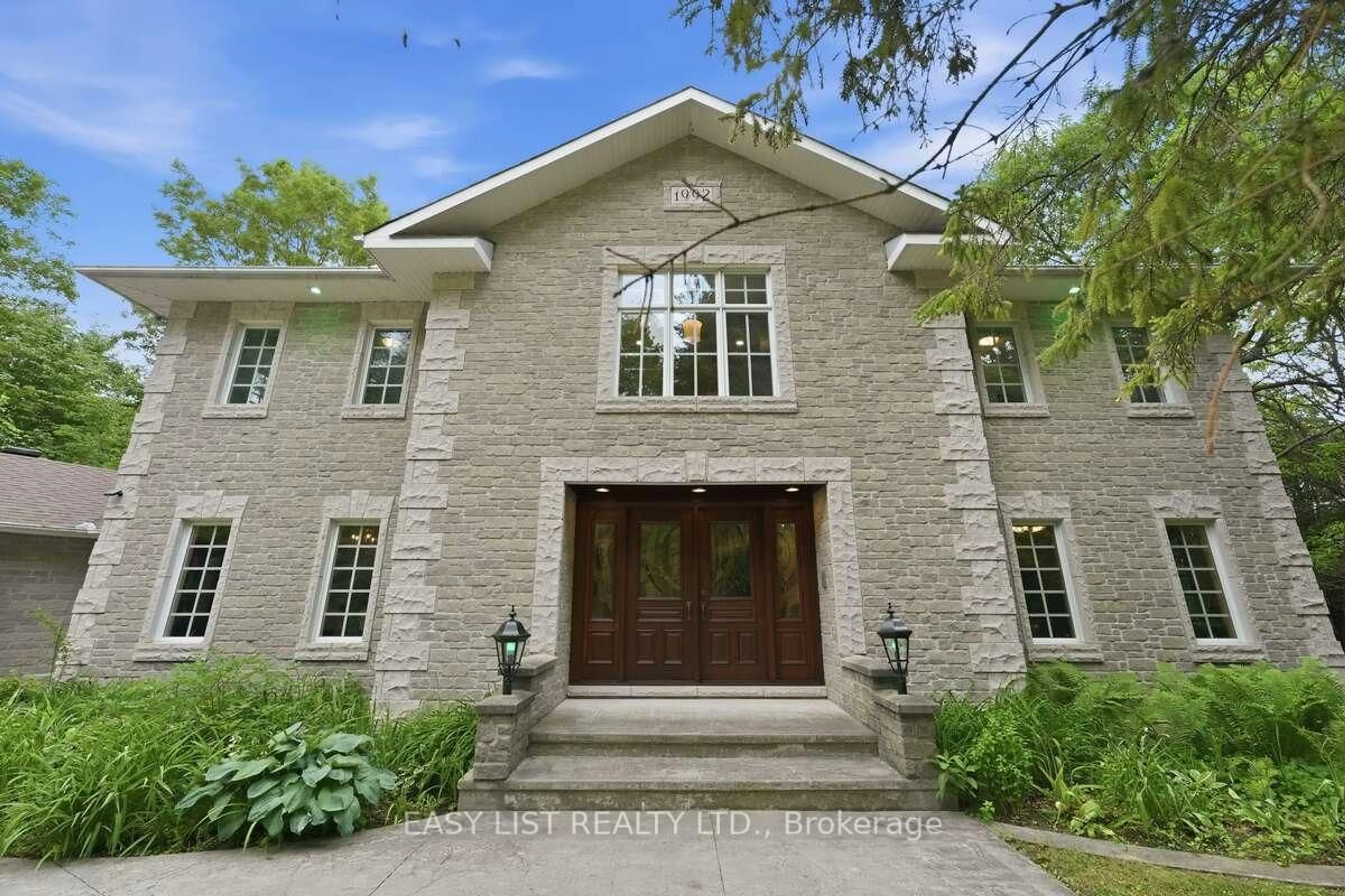 Home with brick exterior material, street for 28 Marchbrook Circ, Ottawa Ontario K2W 1A1
