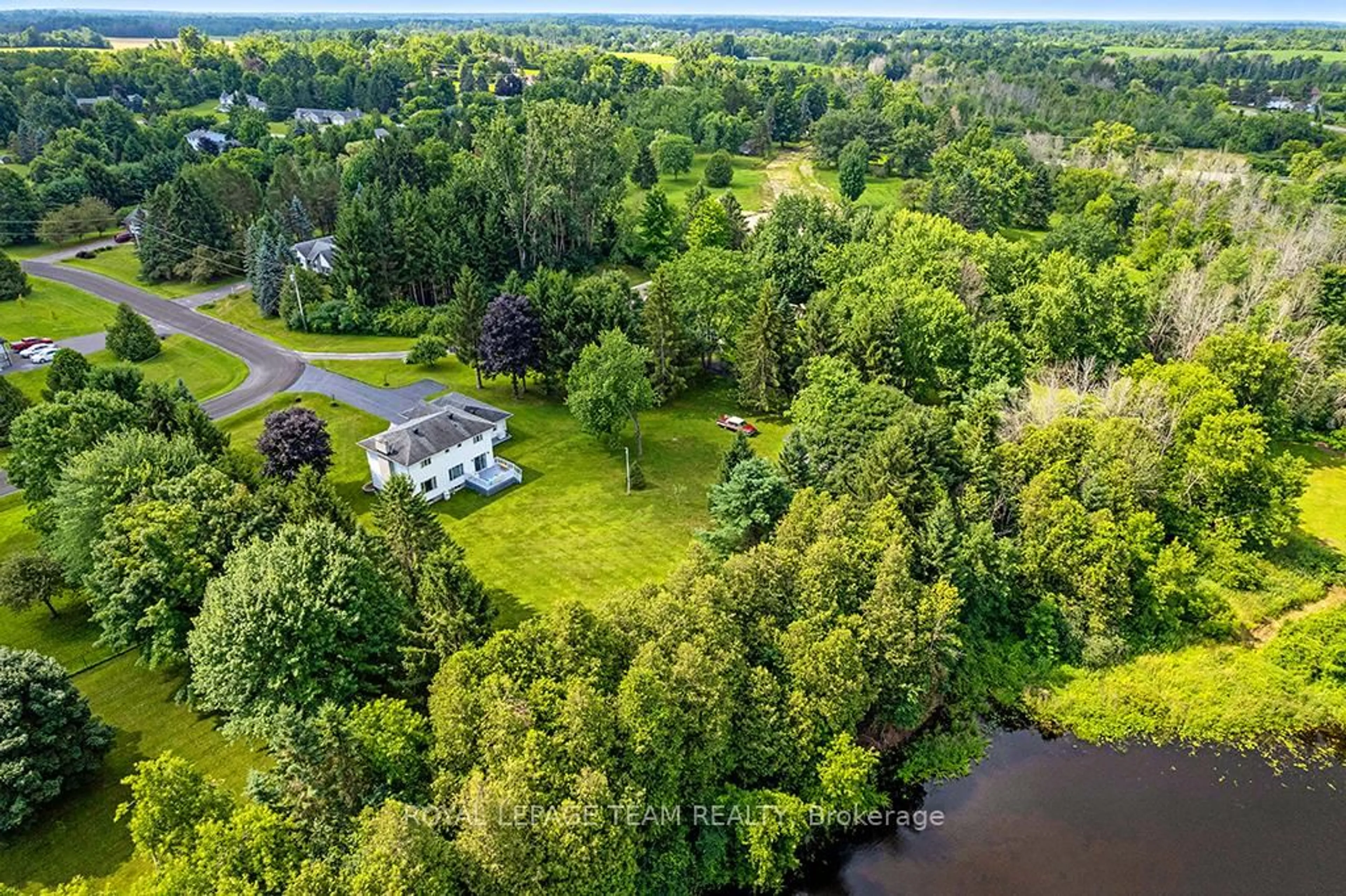 A pic from outside/outdoor area/front of a property/back of a property/a pic from drone, water/lake/river/ocean view for 17 MARIC Tr, North Grenville Ontario K0G 1J0
