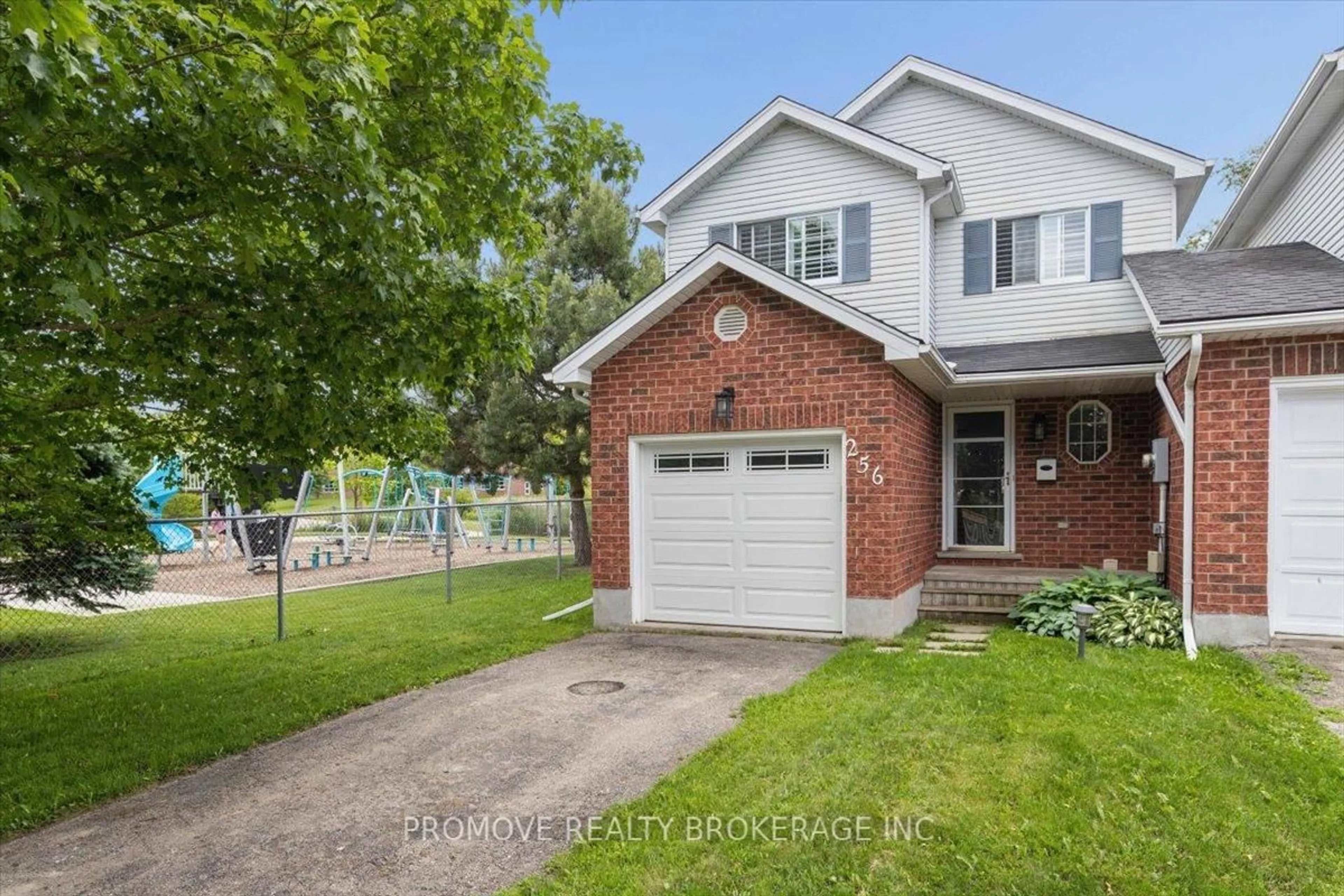 Home with brick exterior material, street for 256 Tait Cres, Centre Wellington Ontario N1M 3P7