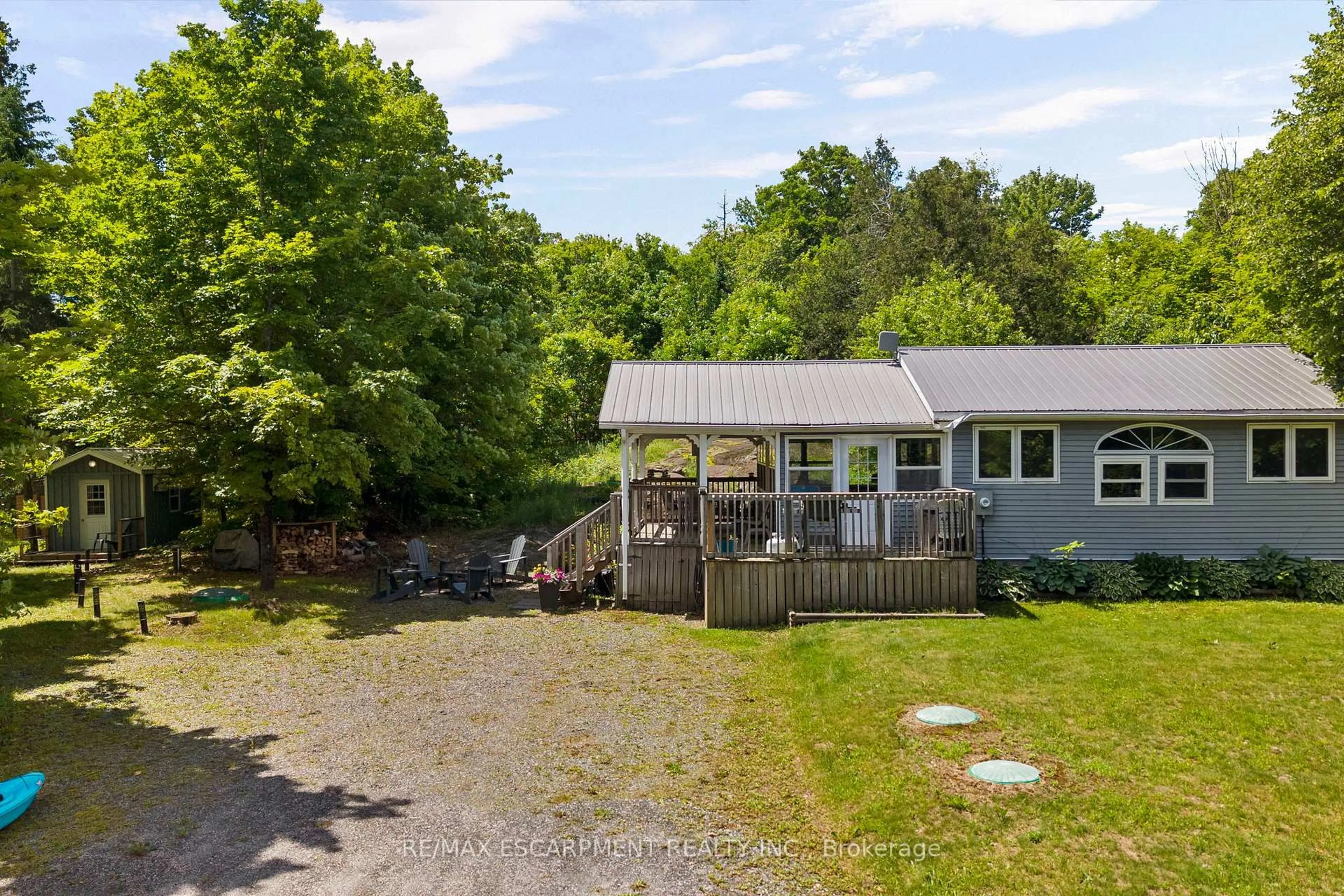 A pic from outside/outdoor area/front of a property/back of a property/a pic from drone, unknown for 545 HURDVILLE Rd, McKellar Ontario P2A 0B5