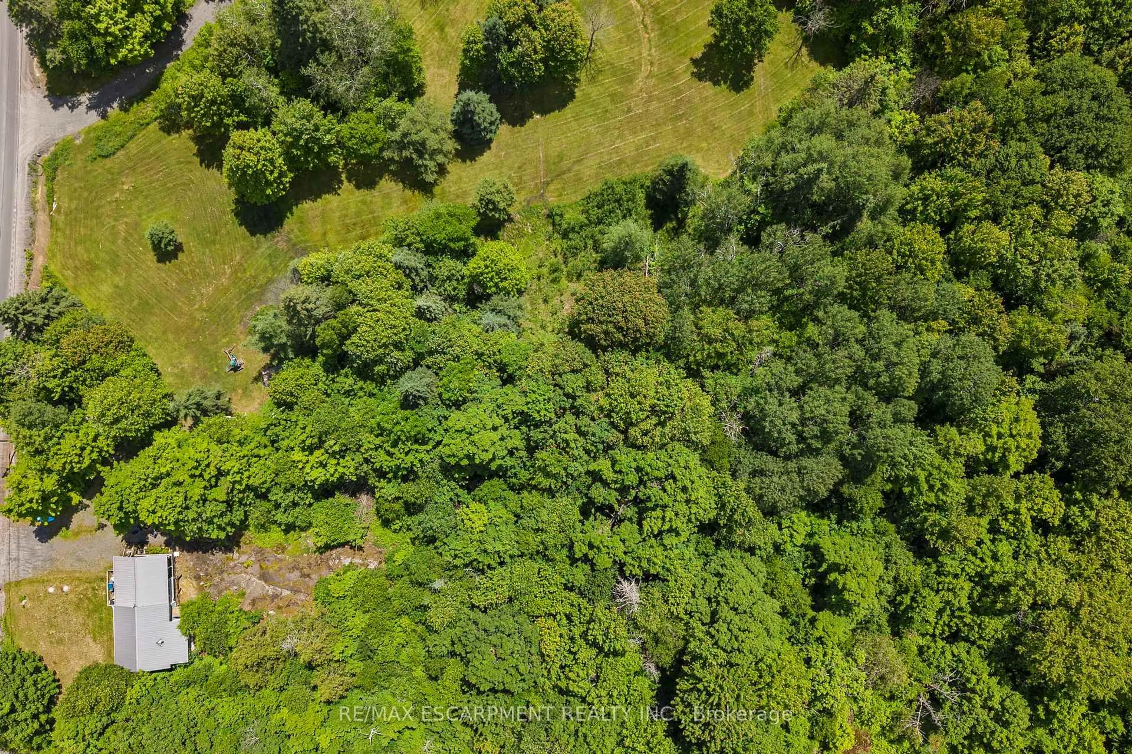 A pic from outside/outdoor area/front of a property/back of a property/a pic from drone, forest/trees view for 545 HURDVILLE Rd, McKellar Ontario P2A 0B5