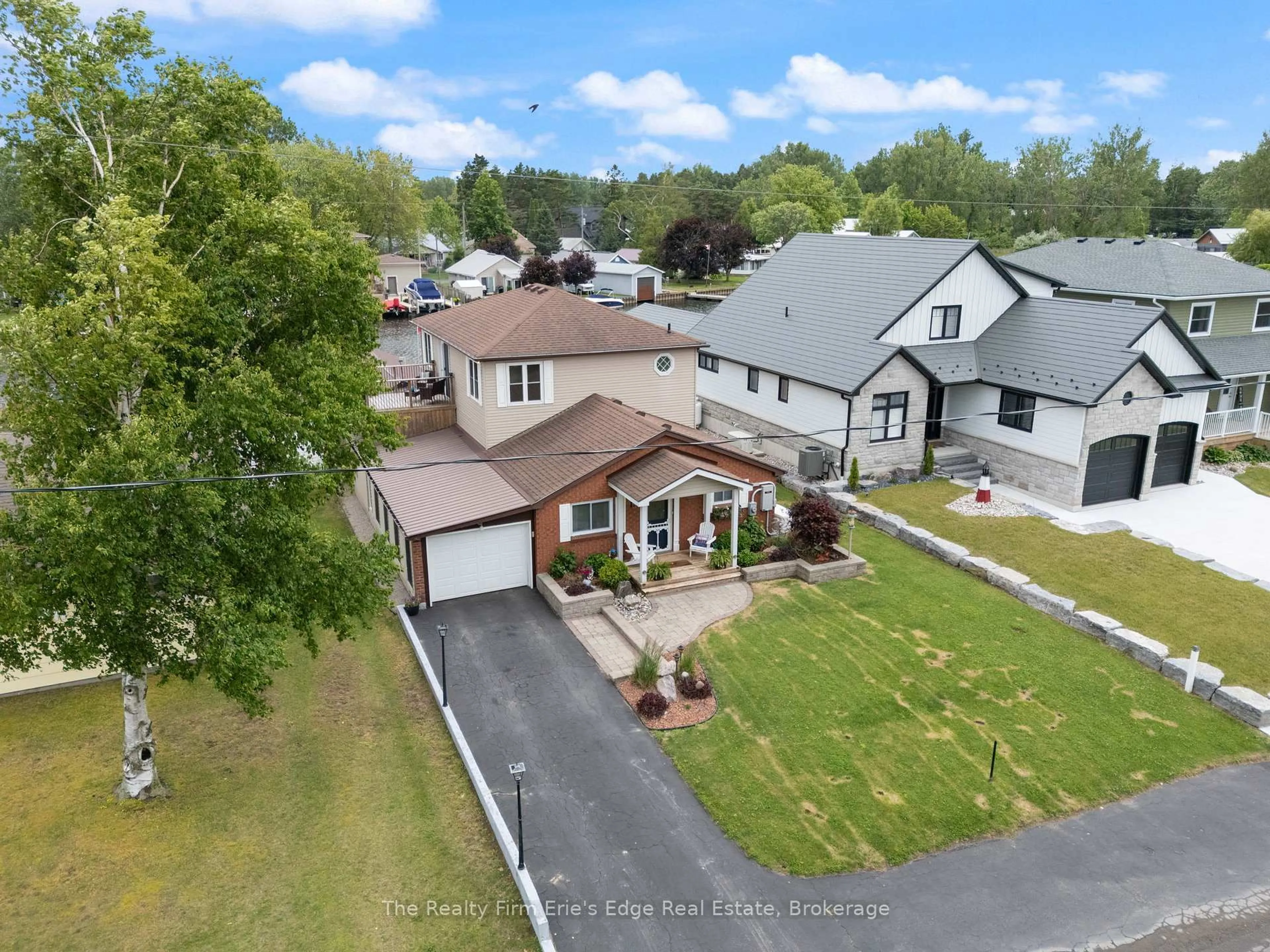 A pic from outside/outdoor area/front of a property/back of a property/a pic from drone, street for 13 Rogers Ave, Norfolk Ontario N0E 1M0