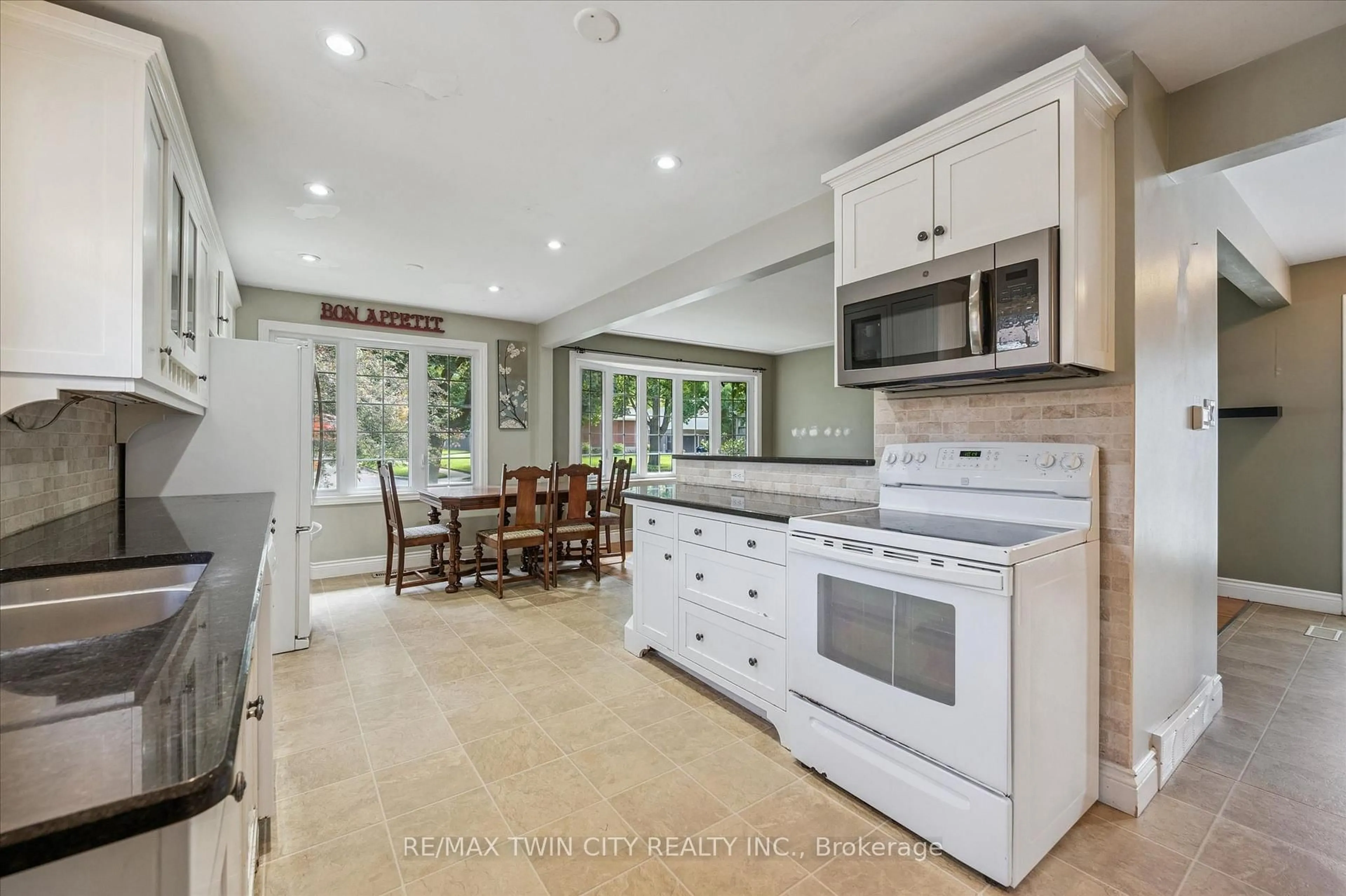 Open concept kitchen, ceramic/tile floor for 107 Queenston Dr, Kitchener Ontario N2B 2V2