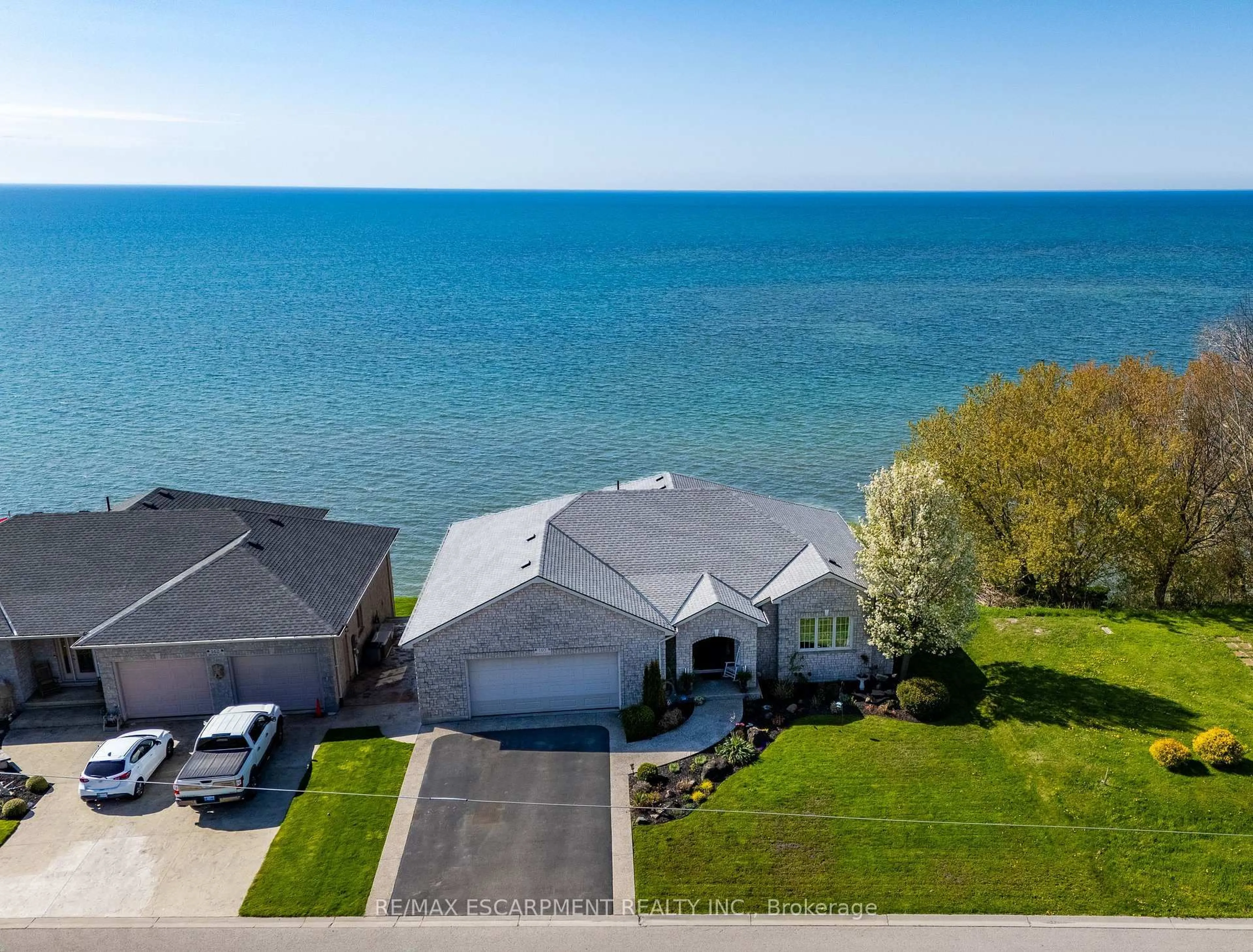 A pic from outside/outdoor area/front of a property/back of a property/a pic from drone, water/lake/river/ocean view for 140 Brown St, Norfolk Ontario N0A 1N7