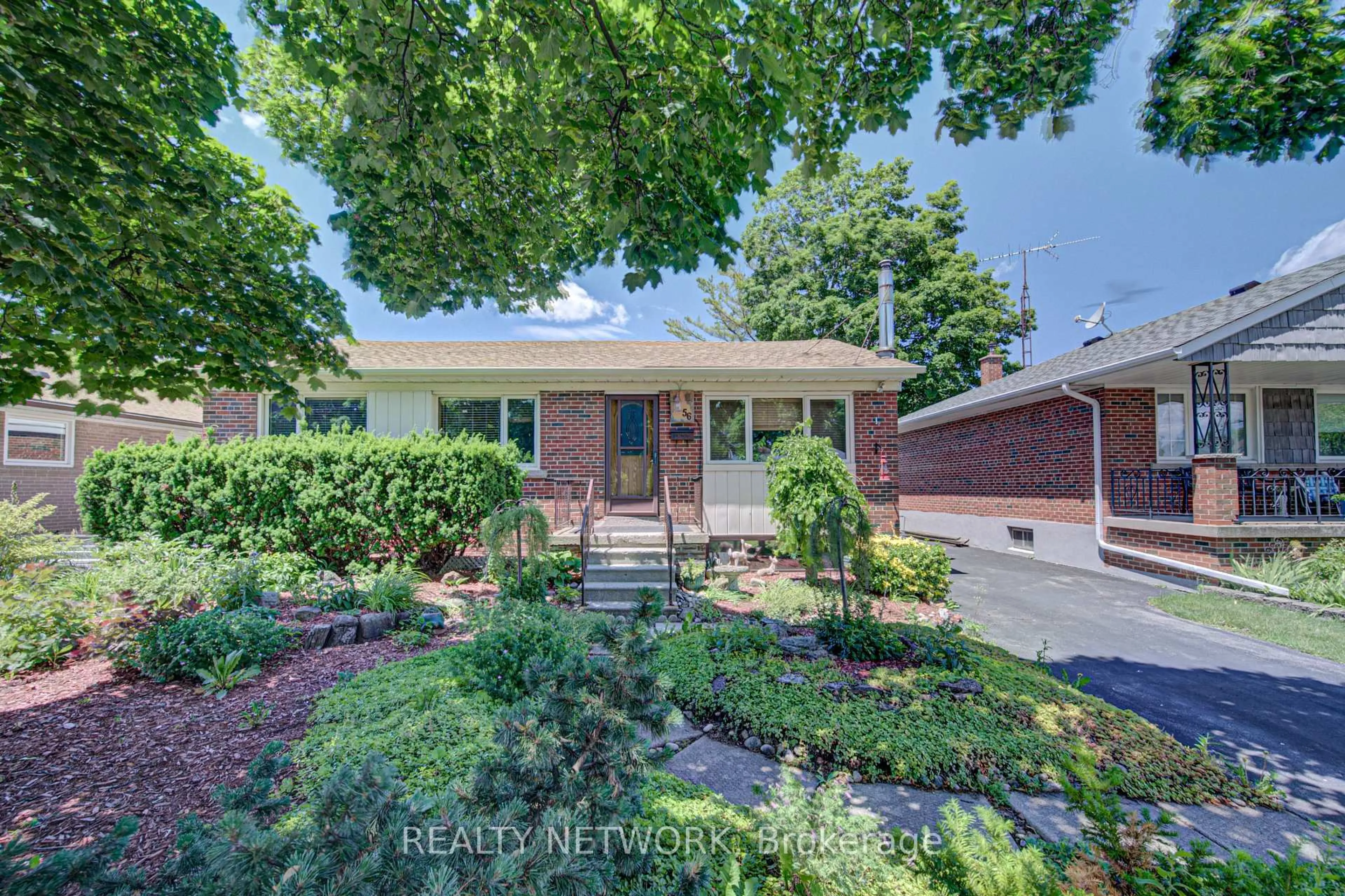 Home with brick exterior material, street for 56 Ferrara St, Hamilton Ontario L8T 4C4